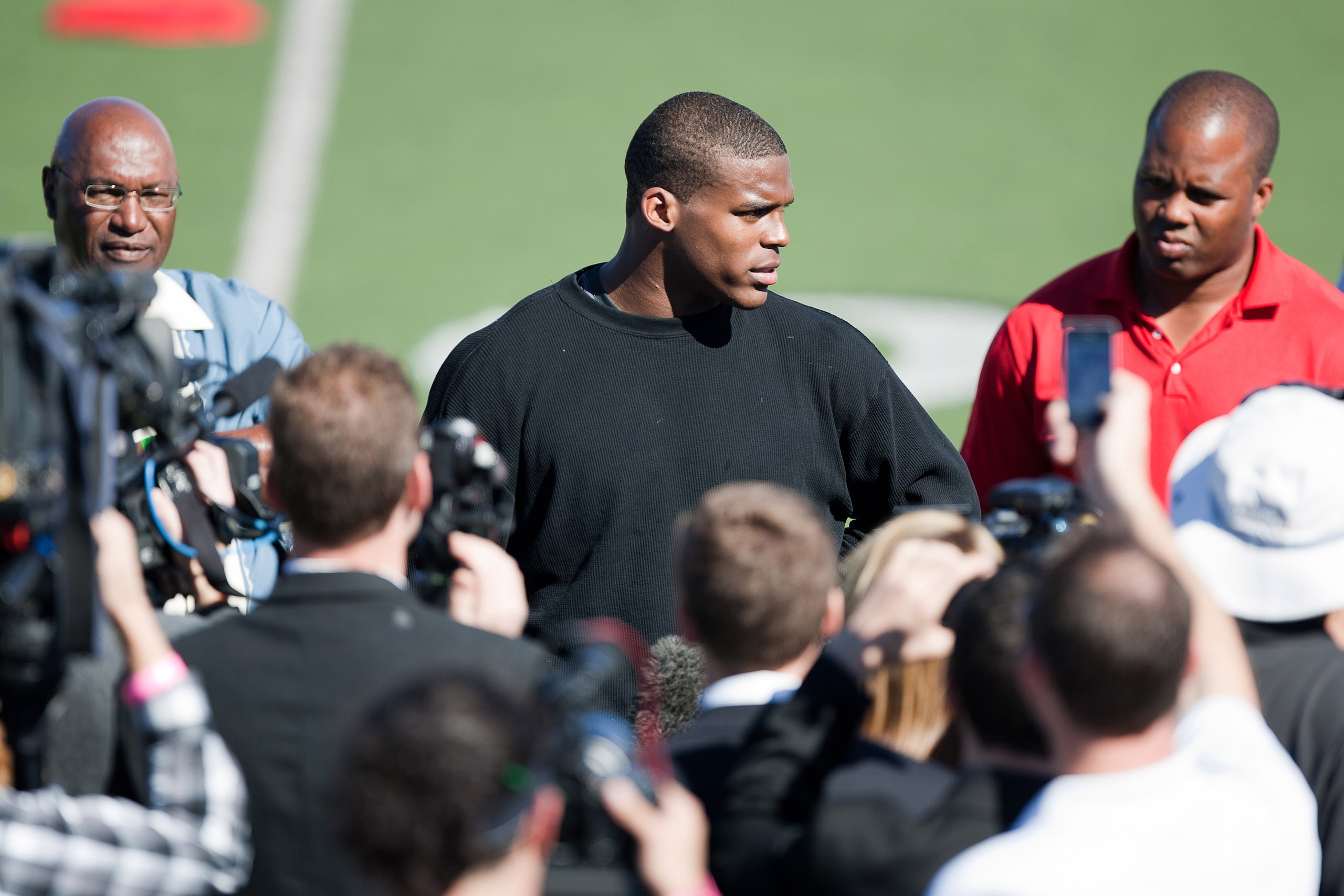 SAN DIEGO, CA - FEBRUARY 10: 2010 Heisman Trophy winning quarterback Cam Newton of Auburn answers questions after his workout routine for the media at Cathedral High School's sports stadium on February 10, 2011 in San Diego, California. (Photo by Kent Hor SAN DIEGO, CA - FEBRUARY 10: 2010 Heisman Trophy winning quarterback Cam Newton of Auburn answers questions after his workout routine for the media at Cathedral High School's sports stadium on February 10, 2011 in San Diego, California. (Photo by Kent Hor