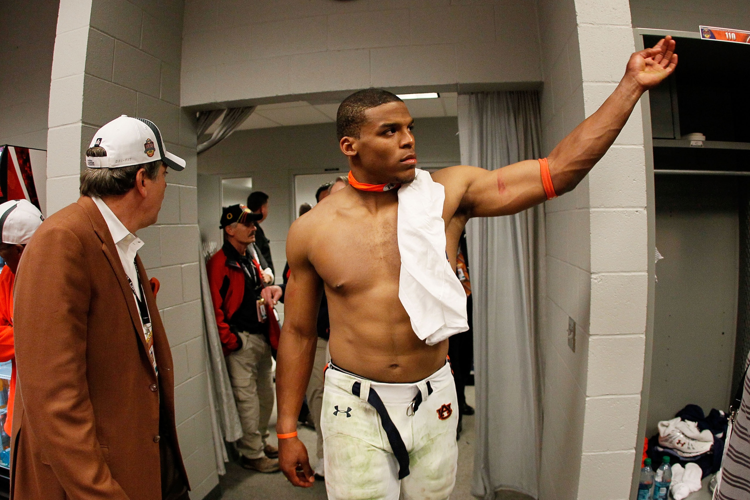 GLENDALE, AZ - JANUARY 10: Quarterback Cameron Newton #2 of the Auburn Tigers celebrates their 22-19 victory in the locker room after defeating the Oregon Ducks in the Tostitos BCS National Championship Game at University of Phoenix Stadium on January 10 GLENDALE, AZ - JANUARY 10: Quarterback Cameron Newton #2 of the Auburn Tigers celebrates their 22-19 victory in the locker room after defeating the Oregon Ducks in the Tostitos BCS National Championship Game at University of Phoenix Stadium on January 10
