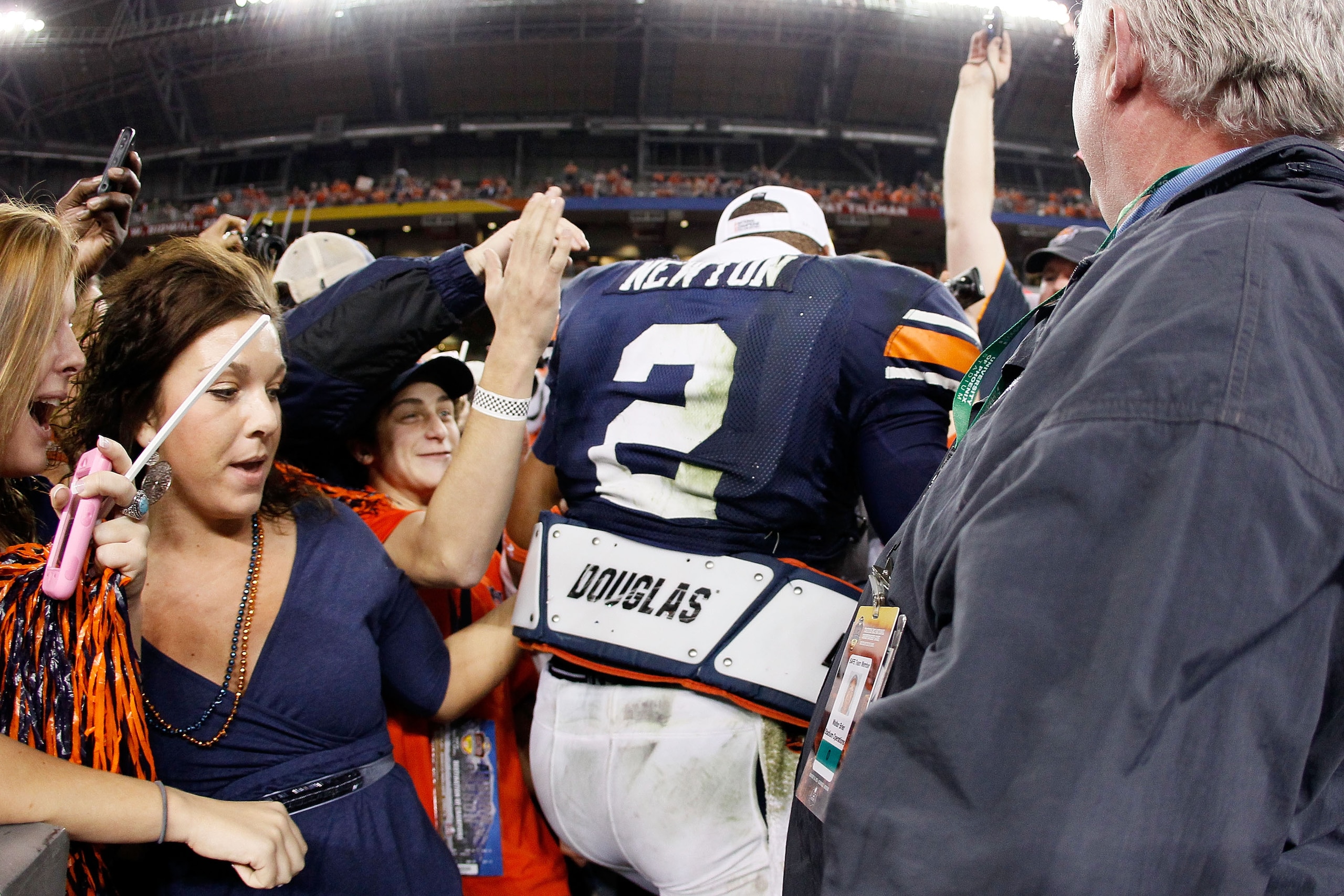 GLENDALE, AZ - JANUARY 10: Quarterback Cameron Newton #2 of the Auburn Tigers celebrates their 22-19 victory after defeating the Oregon Ducks in the Tostitos BCS National Championship Game at University of Phoenix Stadium on January 10, 2011 in Glendale, GLENDALE, AZ - JANUARY 10: Quarterback Cameron Newton #2 of the Auburn Tigers celebrates their 22-19 victory after defeating the Oregon Ducks in the Tostitos BCS National Championship Game at University of Phoenix Stadium on January 10, 2011 in Glendale,