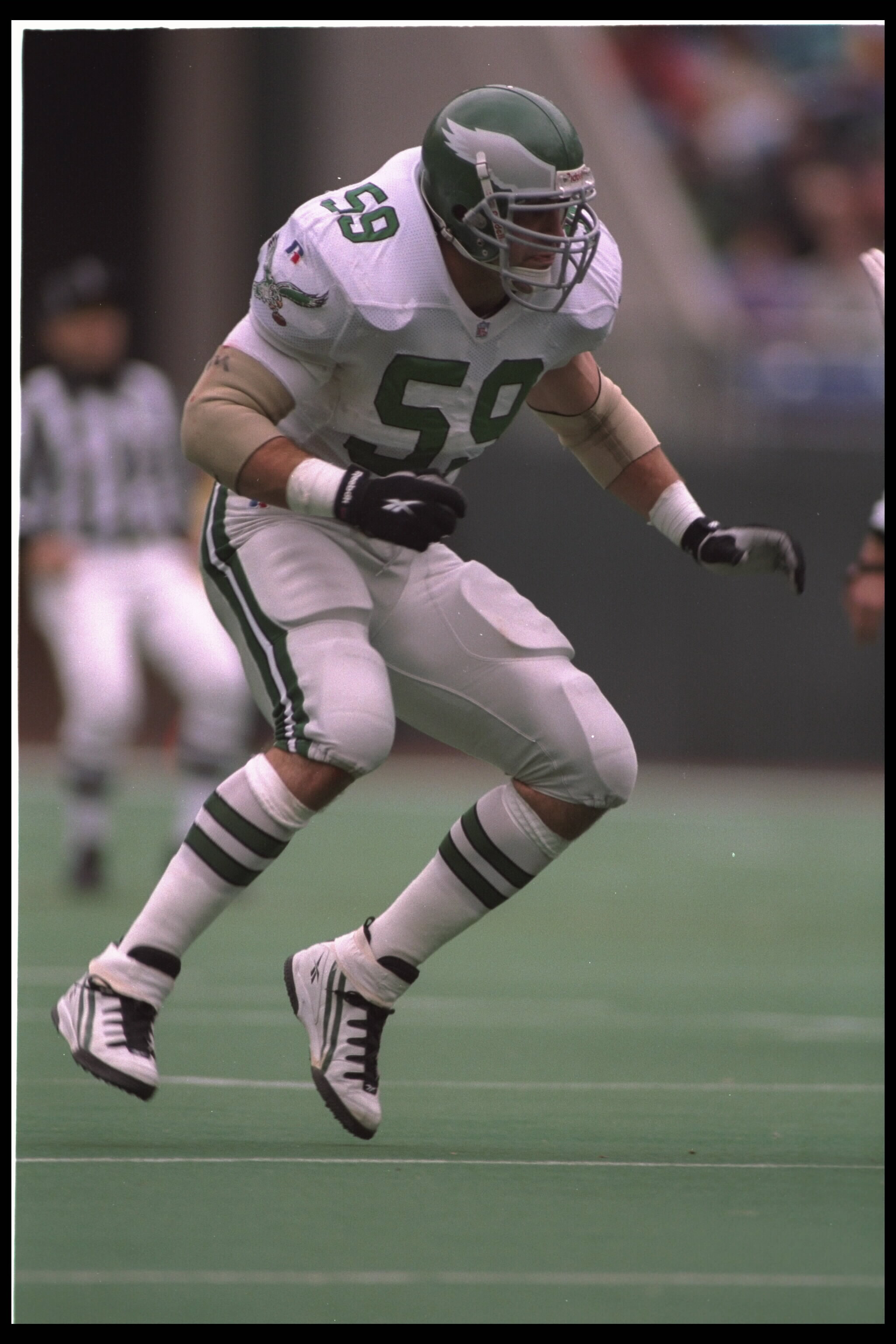 19 Nov 1995:  Linebacker Mike Mamula #59 of the Philadelphia Eagles blocks the defense of the New York Giants at Veterans Stadium in Philadelphia, Pennsylvania.  The Eagles defeated the Giants 28-19.  Mandatory Credit:  Ken White/Allsport