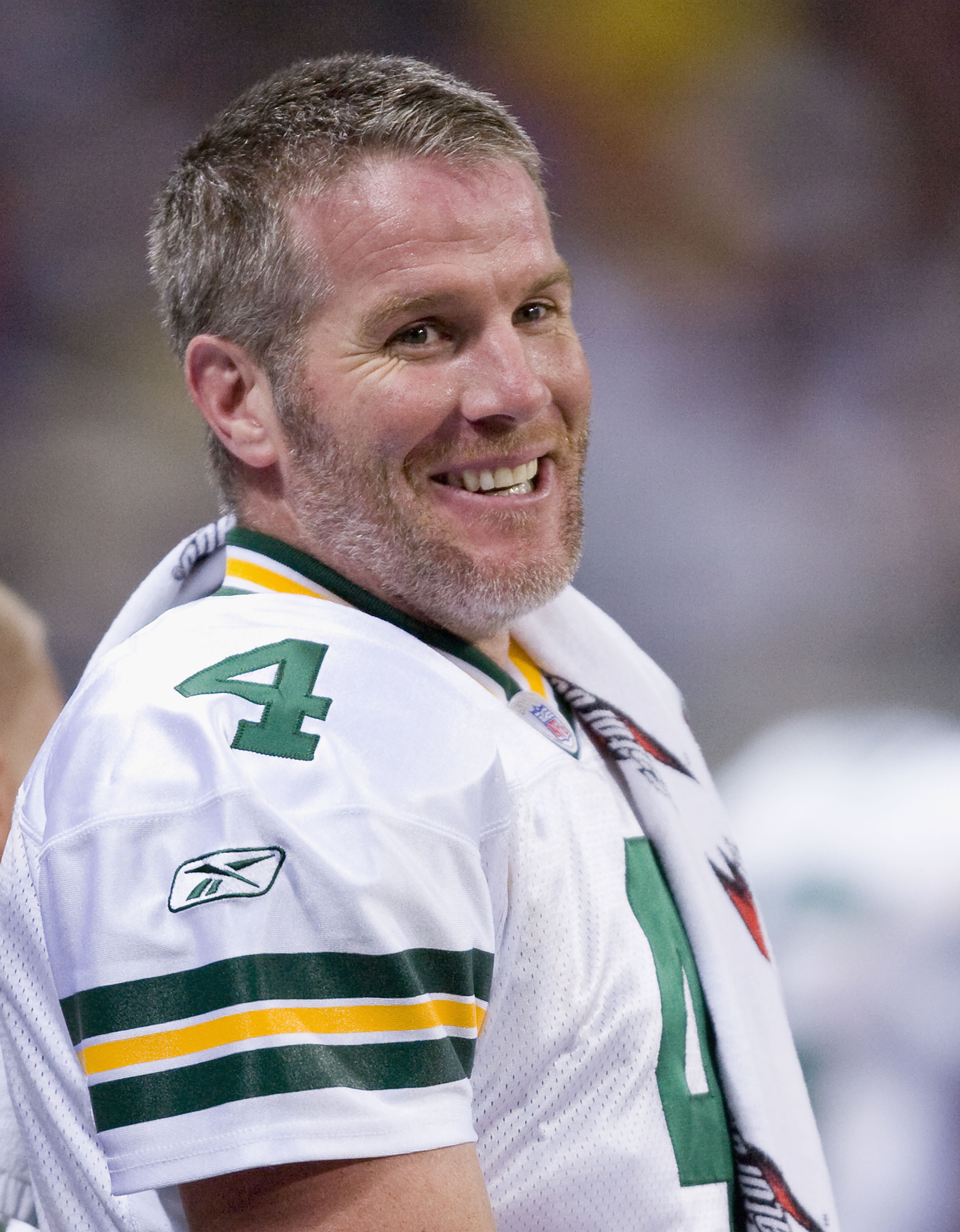 ST. LOUIS, MO - DECEMBER 16: Brett Favre #4 of the Green Bay Packers laughs while on the sideline against the St. Louis Rams at the Edward Jones Dome December 16, 2007 in St. Louis, Missouri.  The Packers beat the Rams 33-14.  (Photo by Dilip Vishwanat/Ge