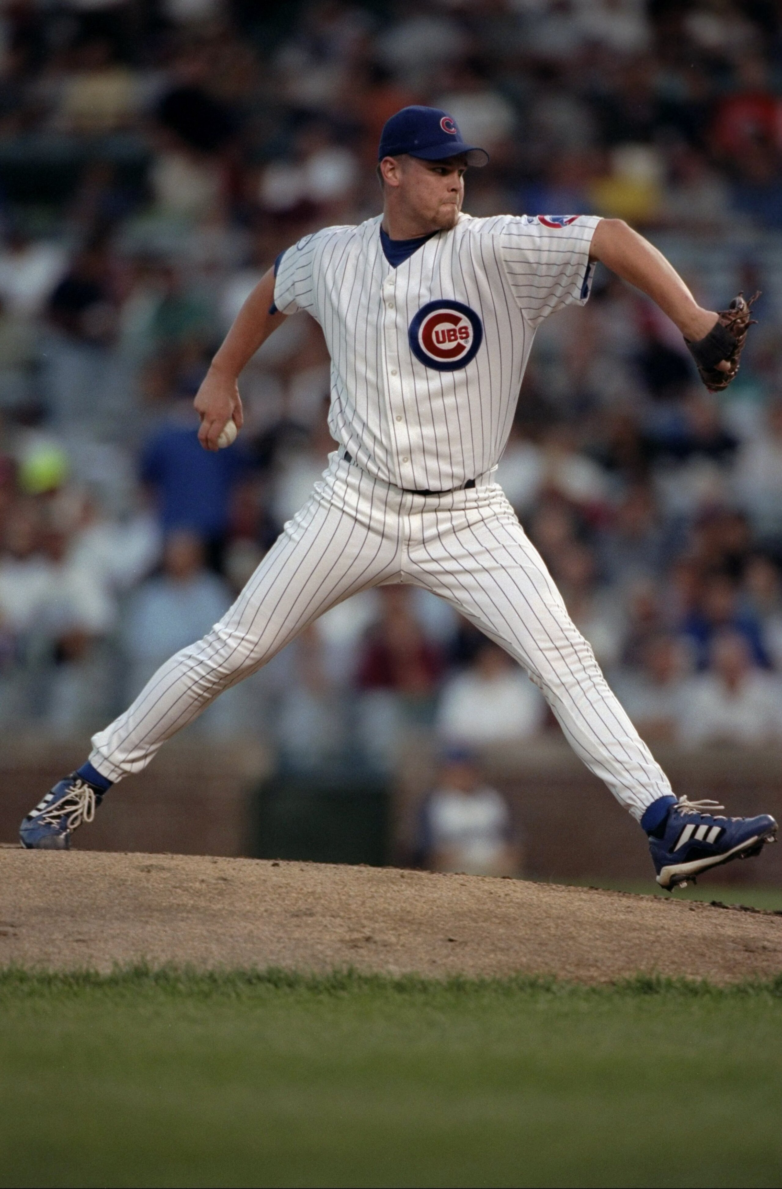 31 Aug 1998: Pitcher Kerry Wood #34 of the Chicago Cubs swings back to throw during the game against the Cincinnati Reds at Wrigley Field in Chicago Illinois. The Cubs defeated the Reds 5-4. 31 Aug 1998: Pitcher Kerry Wood #34 of the Chicago Cubs swings back to throw during the game against the Cincinnati Reds at Wrigley Field in Chicago Illinois. The Cubs defeated the Reds 5-4.