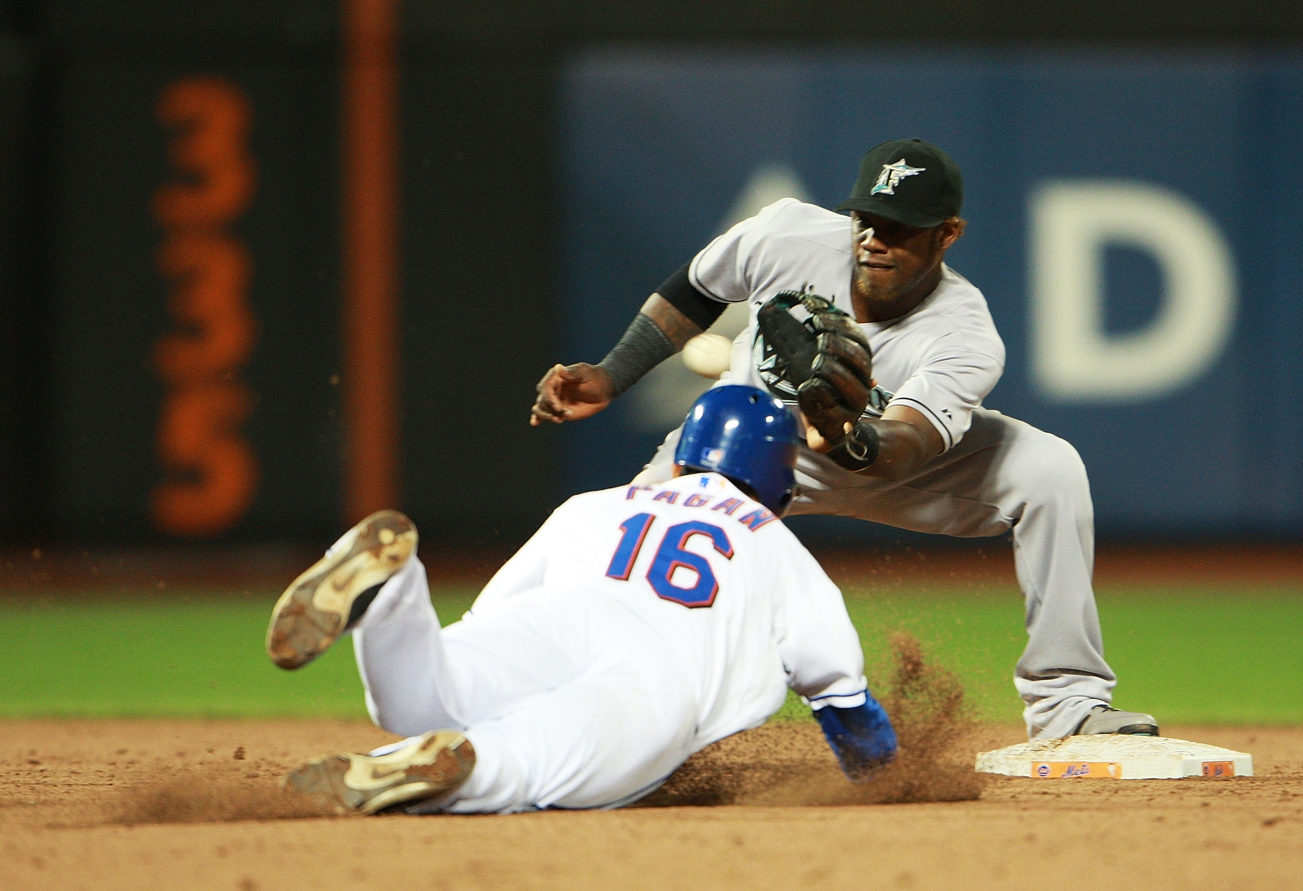 NEW YORK - AUGUST 25: Angel Pagan #16 of the New York Mets is caught stealing second by Hanley Ramirez #2 of the Florida Marlins in the third inning on August 25, 2010 at Citi Field in the Flushing neighborhood of the Queens borough of New York City.  (Ph