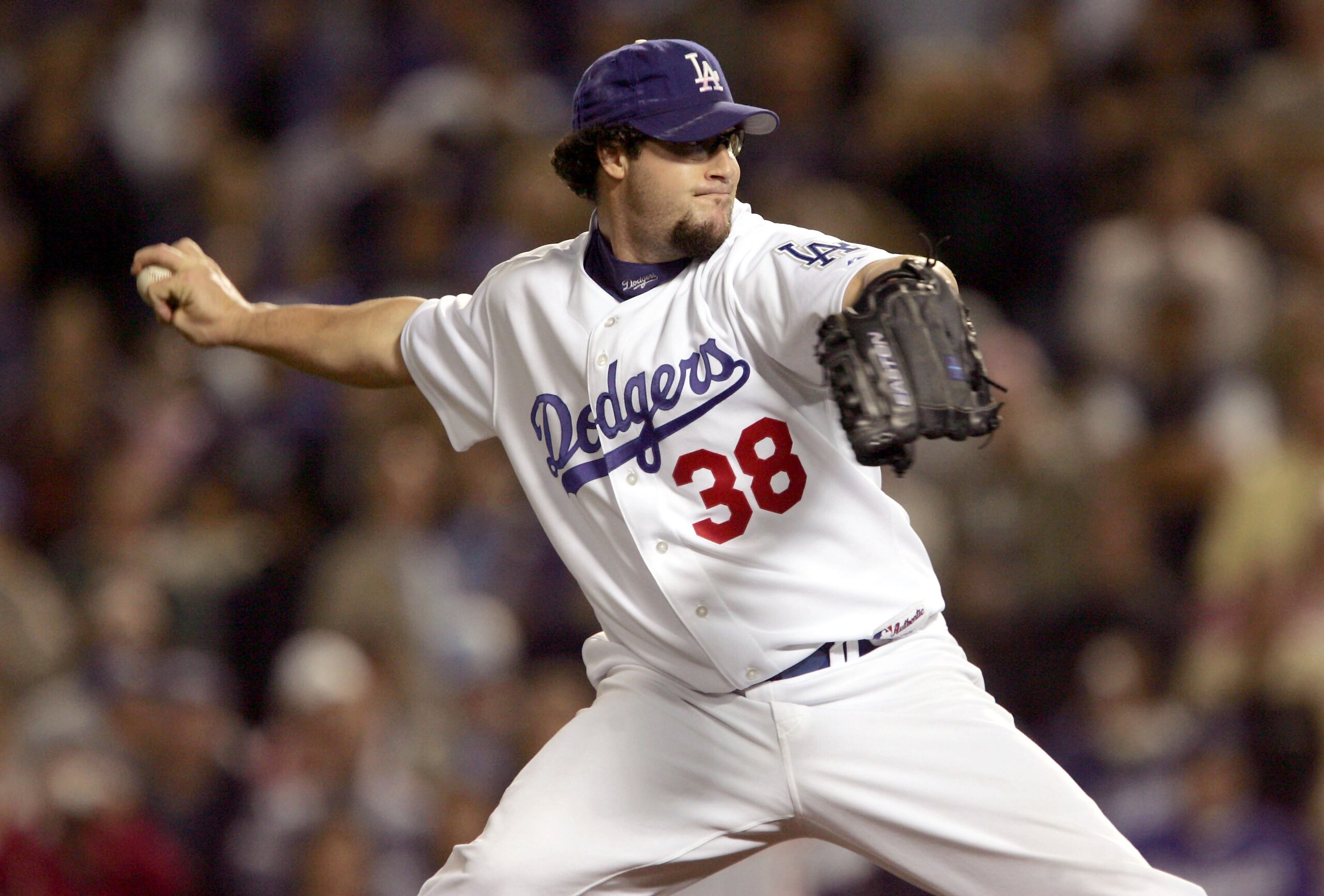 LOS ANGELES - JUNE 6: Closer Eric Gagne #38 of the Los Angeles Dodgers throws a pitch in the ninth inning against the Detroit Tigers on June 6, 2005 at Dodger Stadium in Los Angeles, California. Gagne retired the side in order to pick up his sixth save LOS ANGELES - JUNE 6: Closer Eric Gagne #38 of the Los Angeles Dodgers throws a pitch in the ninth inning against the Detroit Tigers on June 6, 2005 at Dodger Stadium in Los Angeles, California. Gagne retired the side in order to pick up his sixth save