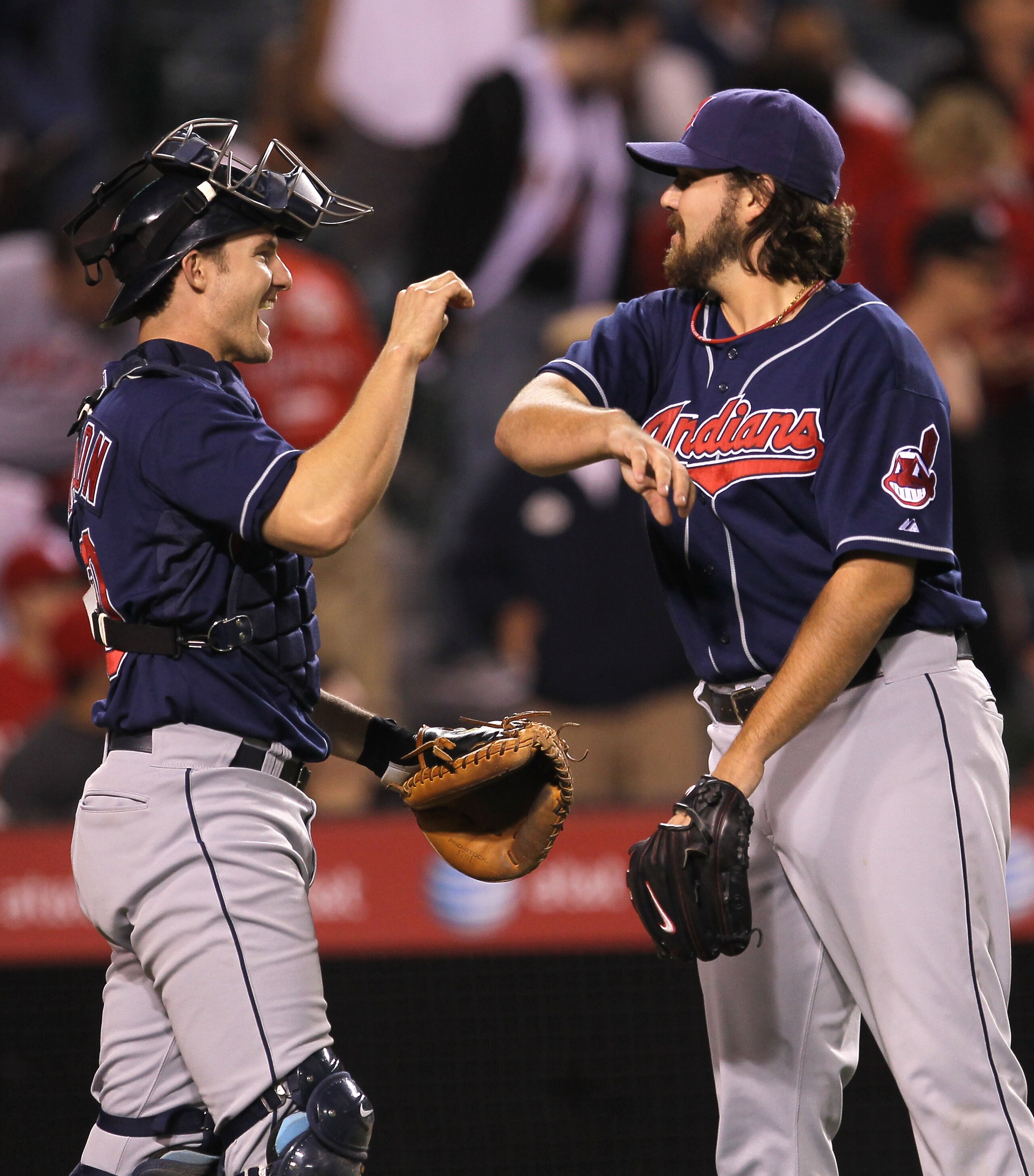 ANAHEIM, CA - SEPTEMBER 06:  Closer Chris Perez #54 and catcher Lou Marson #14 of the Cleveland Indians celebrate after getting the final out against the Los Angeles Angels of Anaheim on September 6, 2010 at Angel Stadium in Anaheim, California. The India