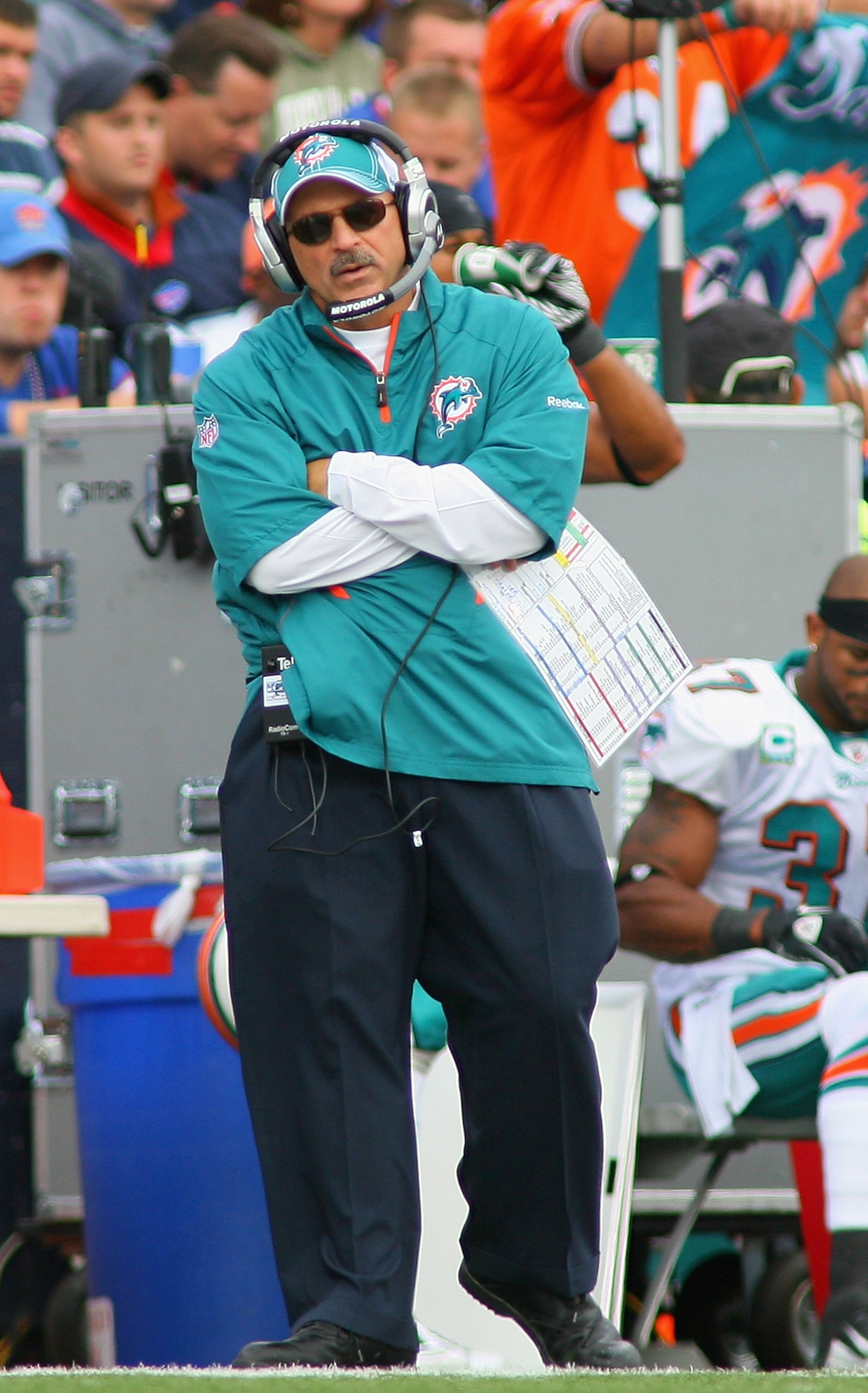 ORCHARD PARK, NY - SEPTEMBER 12: Tony Sparano, head coach of the Miami Dolphins stands on the sidelines during the NFL season opener against the Buffalo Bills at Ralph Wilson Stadium on September 12, 2010 in Orchard Park, New York.  (Photo by Rick Stewart