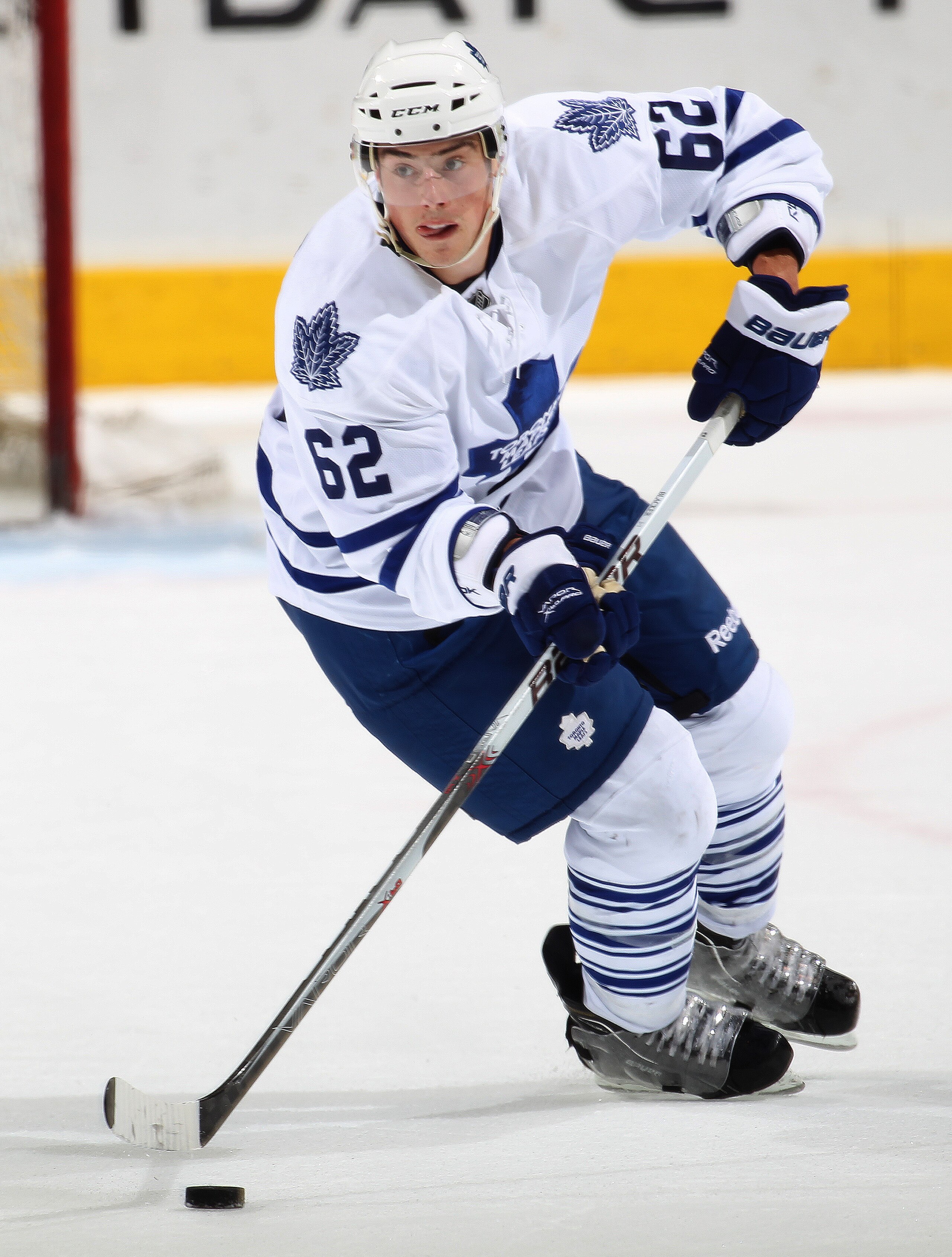 LONDON, CANADA - SEPTEMBER 11:  Jesse Blacker #62 of the Toronto Maple Leafs skates with the puck in a game against the Chicago Black Hawks during the NHL Rookie Tournament on September 11,2010 at the John Labatt Centre in London,Ontario. The Leafs defeat