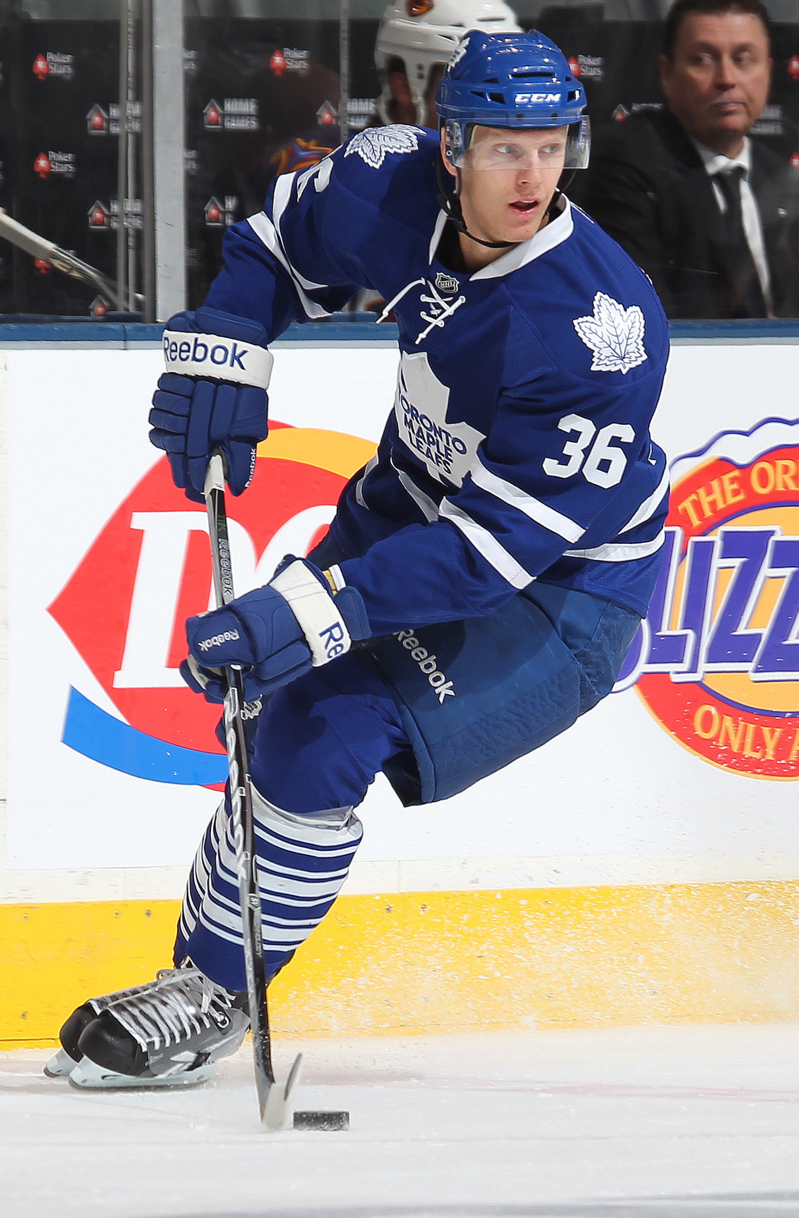 TORONTO, CAN - FEBRUARY 7:  Carl Gunnarsson #36 of the Toronto Maple Leafs turns with the puck in a game against the Atlanta Thrashers on February 7, 2011 at the Air Canada Centre in Toronto, Canada. The Leafs defeated the Thrashers 5-4. (Photo by Claus A