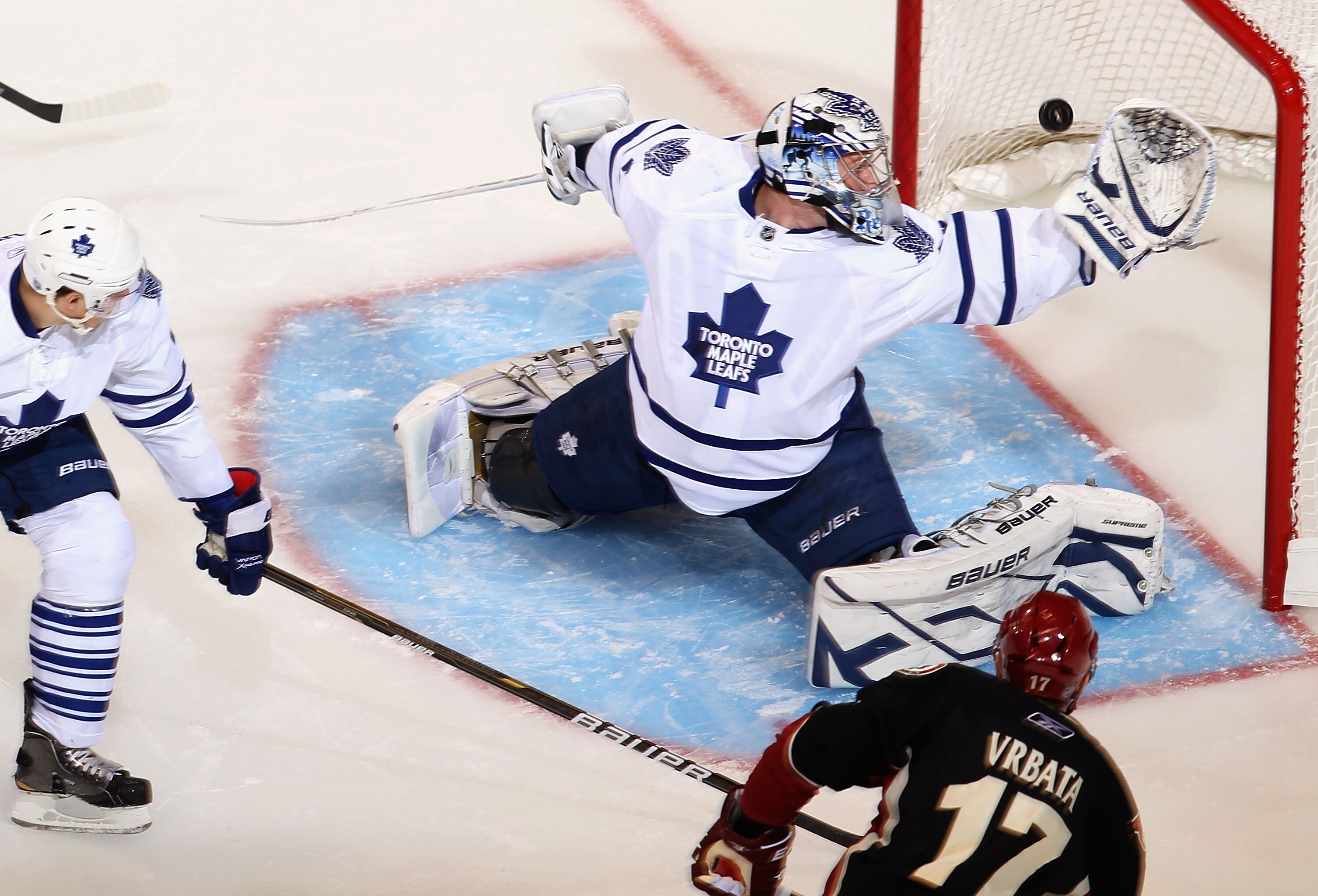 GLENDALE, AZ - JANUARY 13:  Goaltender James Reimer #34 of the Toronto Maple Leafs allows a first period power play goal to Radim Vrbata #17 of the Phoenix Coyotes during the NHL game at Jobing.com Arena on January 13, 2011 in Glendale, Arizona.  (Photo b