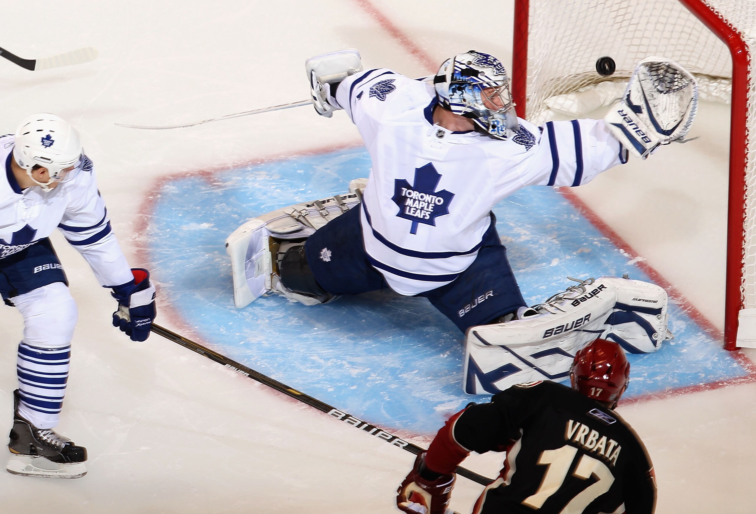 GLENDALE, AZ - JANUARY 13:  Goaltender James Reimer #34 of the Toronto Maple Leafs allows a first period power play goal to Radim Vrbata #17 of the Phoenix Coyotes during the NHL game at Jobing.com Arena on January 13, 2011 in Glendale, Arizona.  (Photo b