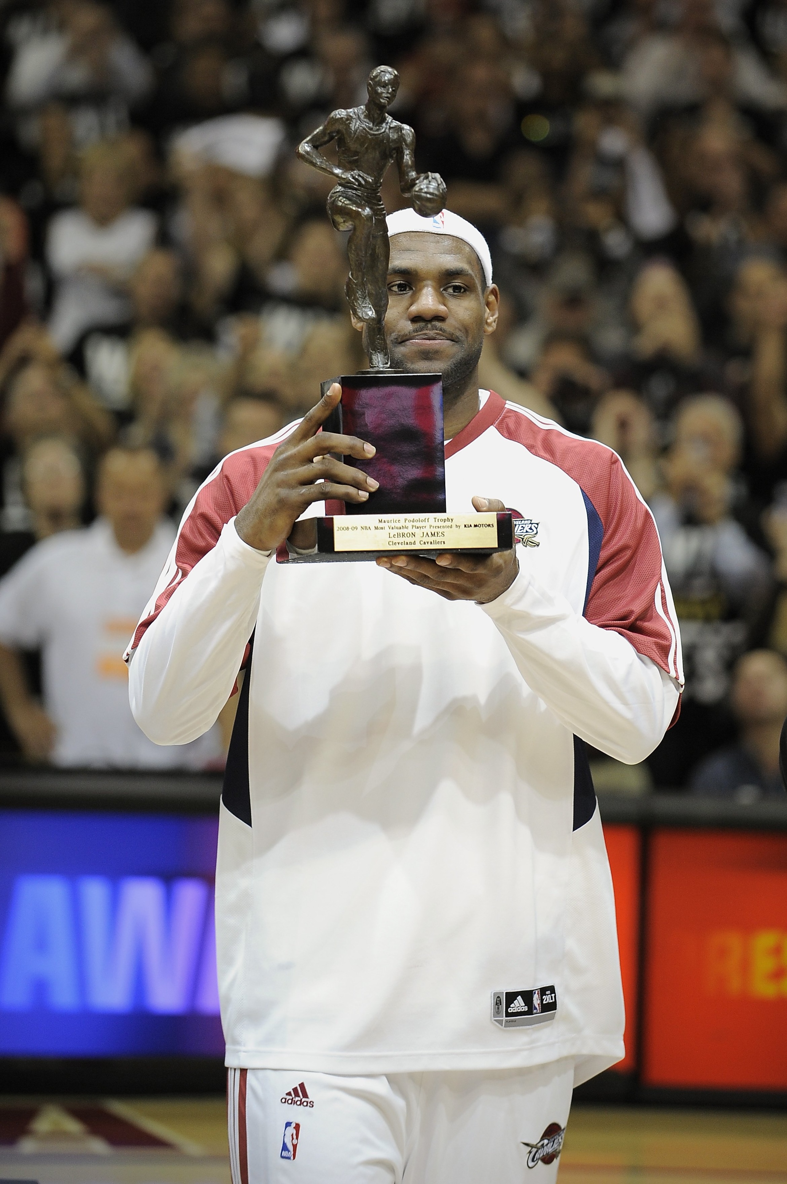 CLEVELAND - MAY 5: LeBron James #23 of the Cleveland Cavaliers receives the 2008-2009 MVP Trophy prior to the start of Game One of the Eastern Conference Semifinals against the Atlanta Hawks during the 2009 NBA Playoffs at Quicken Loans Arena on May 5, 2 CLEVELAND - MAY 5: LeBron James #23 of the Cleveland Cavaliers receives the 2008-2009 MVP Trophy prior to the start of Game One of the Eastern Conference Semifinals against the Atlanta Hawks during the 2009 NBA Playoffs at Quicken Loans Arena on May 5, 2