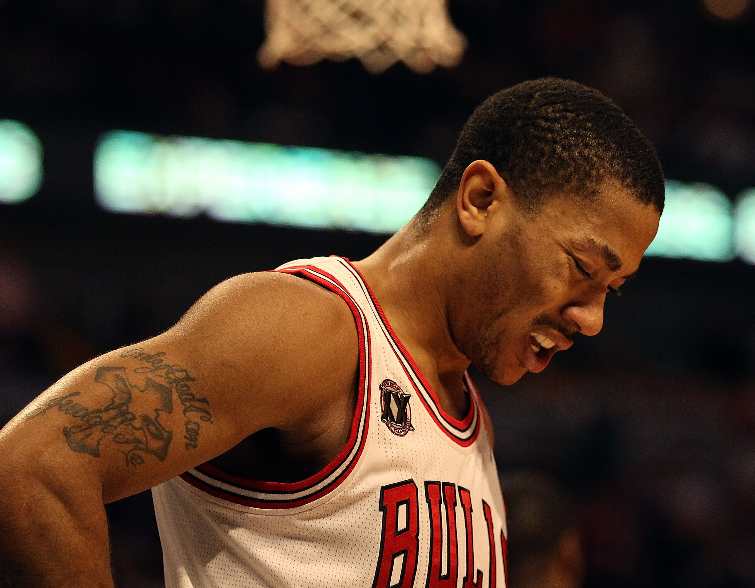CHICAGO, IL - JANUARY 28: Derrick Rose #1 of the Chicago Bulls, playing in pain from an ulcer, reacts as walks to the free-throw line against the Orlando Magic at the United Center on January 28, 2011 in Chicago, Illinois. The Bulls defeated the Magic 99- CHICAGO, IL - JANUARY 28: Derrick Rose #1 of the Chicago Bulls, playing in pain from an ulcer, reacts as walks to the free-throw line against the Orlando Magic at the United Center on January 28, 2011 in Chicago, Illinois. The Bulls defeated the Magic 99-