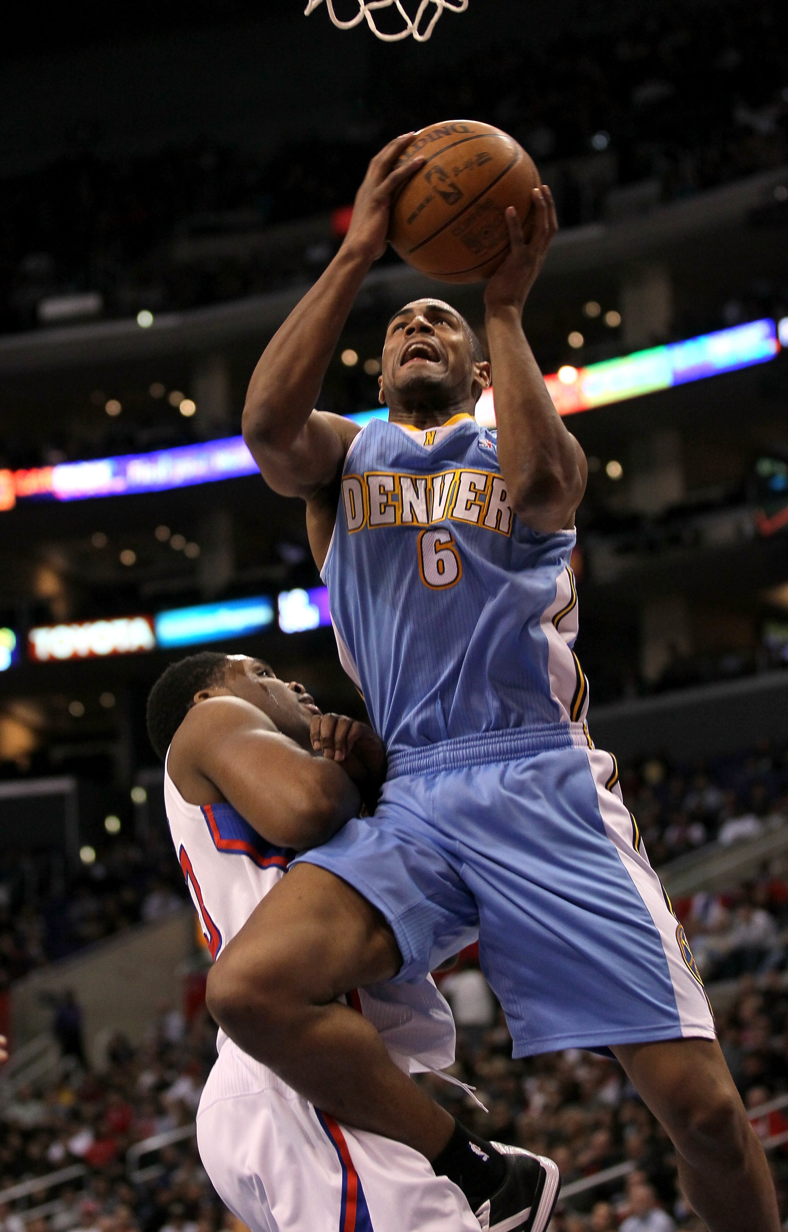 LOS ANGELES, CA - JANUARY 05: Arron Afflalo #6 of the Denver Nuggets shoots over Ike Diogu #50 of the Los Angeles Clippers at Staples Center on January 5, 2011 in Los Angeles, California. The Clippers won 106-93. NOTE TO USER: User expressly acknowled LOS ANGELES, CA - JANUARY 05: Arron Afflalo #6 of the Denver Nuggets shoots over Ike Diogu #50 of the Los Angeles Clippers at Staples Center on January 5, 2011 in Los Angeles, California. The Clippers won 106-93. NOTE TO USER: User expressly acknowled