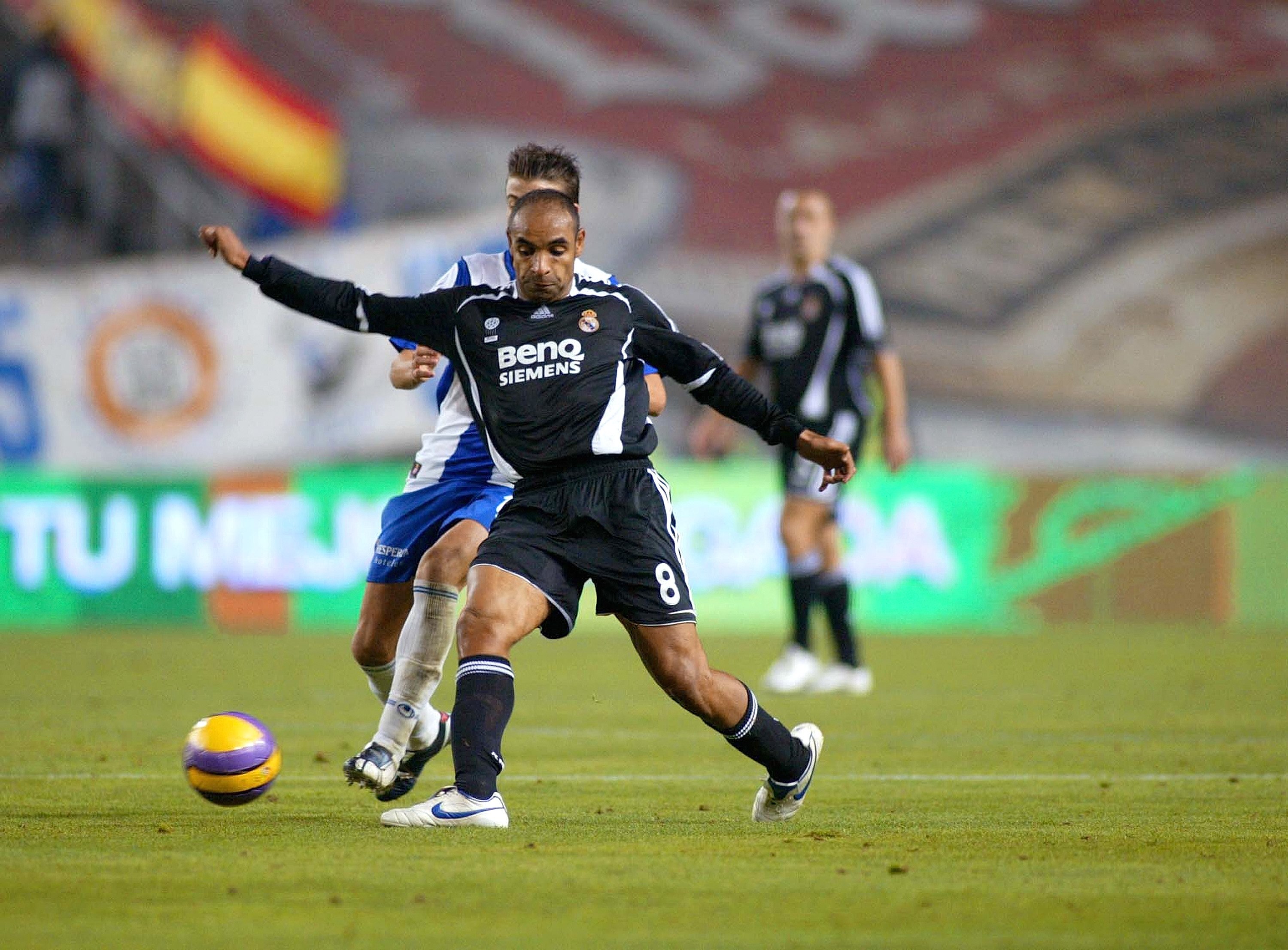 BARCELONA, SPAIN - DECEMBER 17: Emerson of Real Madrid and Luis Garcia of Espanyol in action during the match between RCD Espanyol and Real Madrid, of La Liga, on December 17, 2006 at the Lluis Companys stadium in Barcelona, Spain. (Photo by Bagu Blanco/G