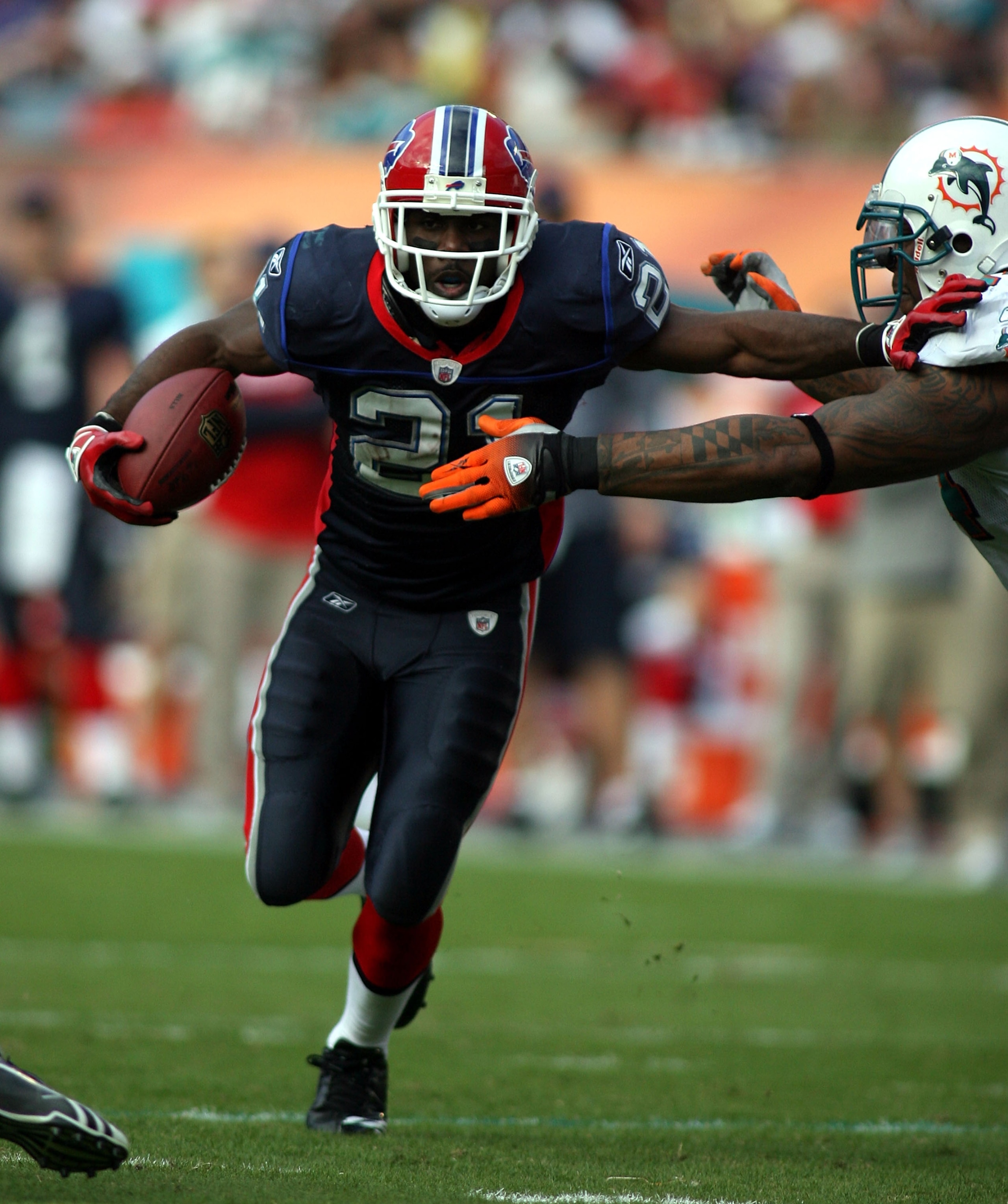 MIAMI - DECEMBER 19:  Running Back C.J. Spiller #21 of the Buffalo Bills runs against the Miami Dolphins at Sun Life Stadium on December 19, 2010 in Miami, Florida.The Bills defeated the Dolphins 17-14.  (Photo by Marc Serota/Getty Images)