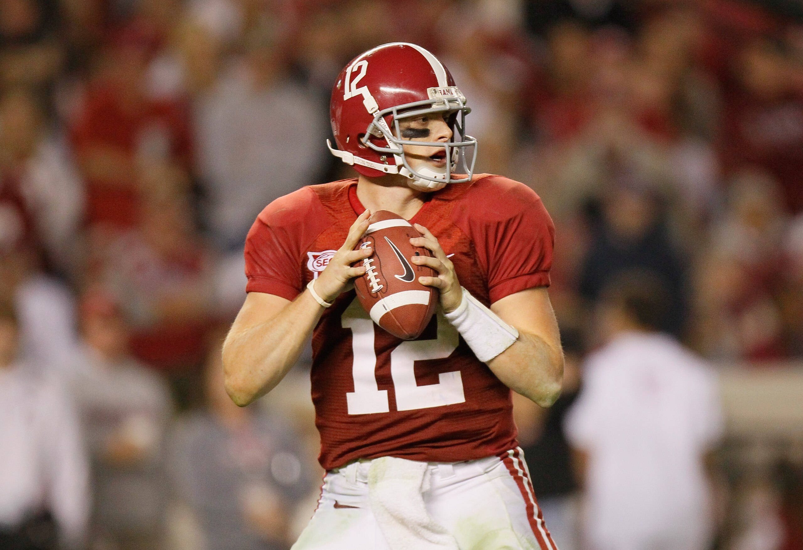 TUSCALOOSA, AL - OCTOBER 16:  Quarterback Greg McElroy #12 of the Alabama Crimson Tide looks to pass against the Ole Miss Rebels at Bryant-Denny Stadium on October 16, 2010 in Tuscaloosa, Alabama.  (Photo by Kevin C. Cox/Getty Images)