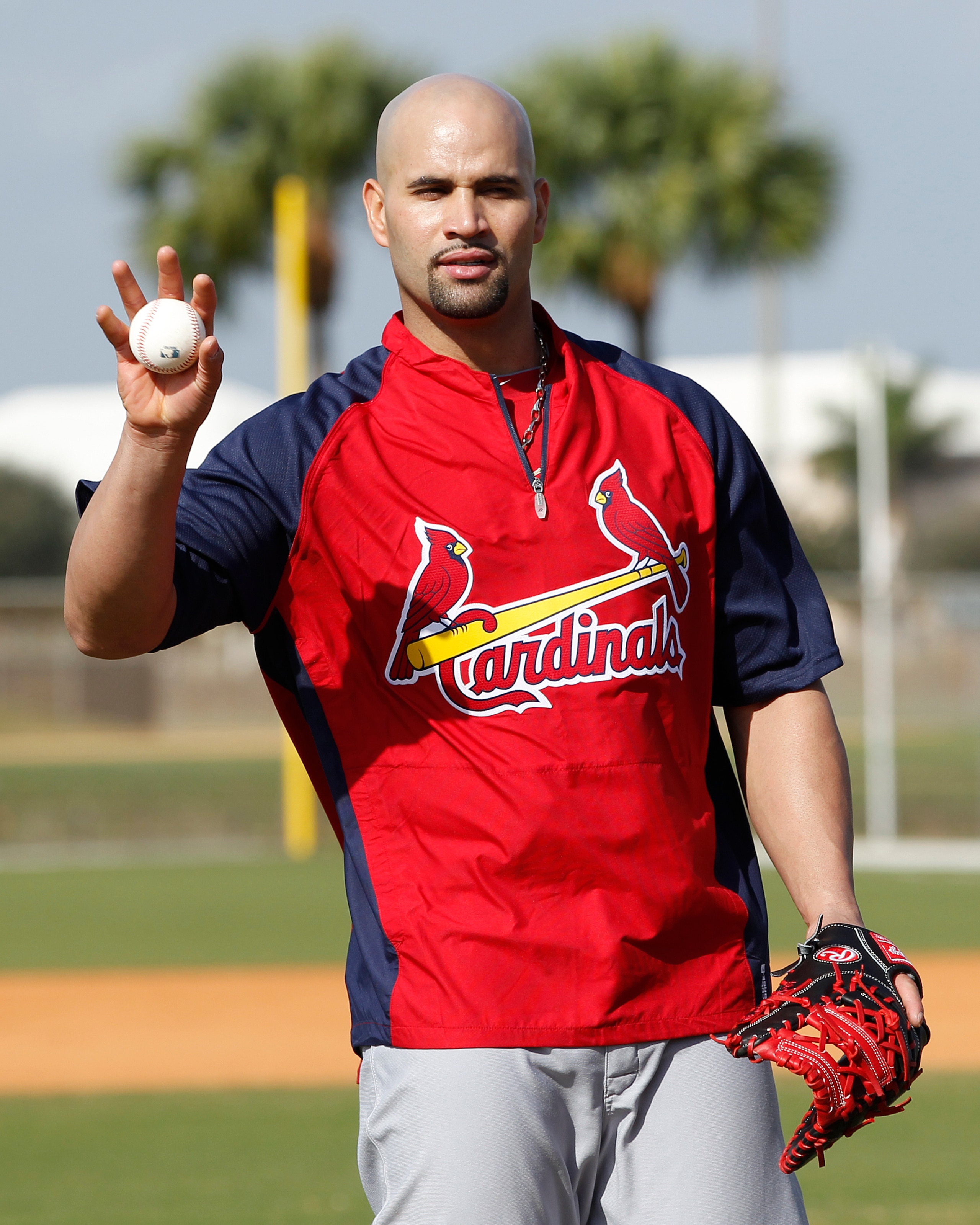 JUPITER, FL - FEBRUARY 17: Albert Pujols #5 #5 of the St. Louis Cardinals catches a ball during infield preactice at Roger Dean Stadium on February 17, 2011 in Jupiter, Florida. (Photo by Joel Auerbach/Getty Images)