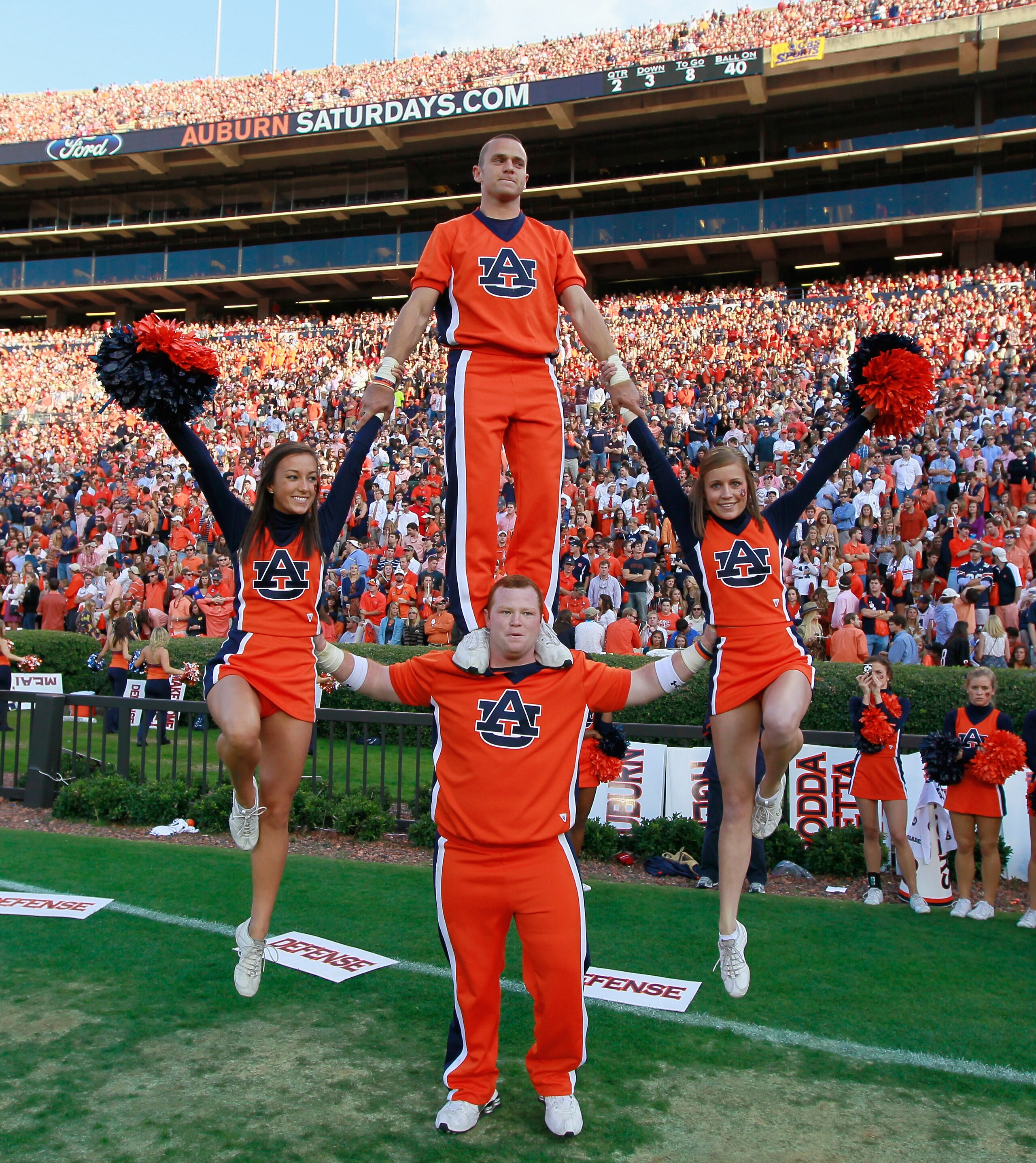 AUBURN, AL - NOVEMBER 13: Cheerleaders of the Auburn Tigers perform against the Georgia Bulldogs at Jordan-Hare Stadium on November 13, 2010 in Auburn, Alabama. (Photo by Kevin C. Cox/Getty Images) AUBURN, AL - NOVEMBER 13: Cheerleaders of the Auburn Tigers perform against the Georgia Bulldogs at Jordan-Hare Stadium on November 13, 2010 in Auburn, Alabama. (Photo by Kevin C. Cox/Getty Images)