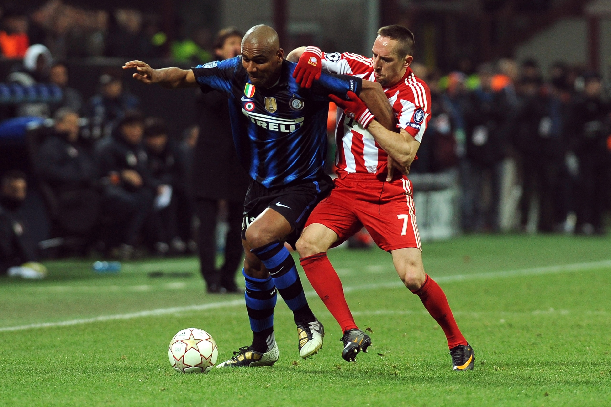 MILAN, ITALY - FEBRUARY 23: Douglas Maicon of Inter Milan competes with Franck Ribery of FC Bayern Muenchen during the UEFA Champions League round of 16 first leg match between Inter Milan v FC Bayern Muenchen on February 23, 2011 in Milan, Italy. (Phot MILAN, ITALY - FEBRUARY 23: Douglas Maicon of Inter Milan competes with Franck Ribery of FC Bayern Muenchen during the UEFA Champions League round of 16 first leg match between Inter Milan v FC Bayern Muenchen on February 23, 2011 in Milan, Italy. (Phot
