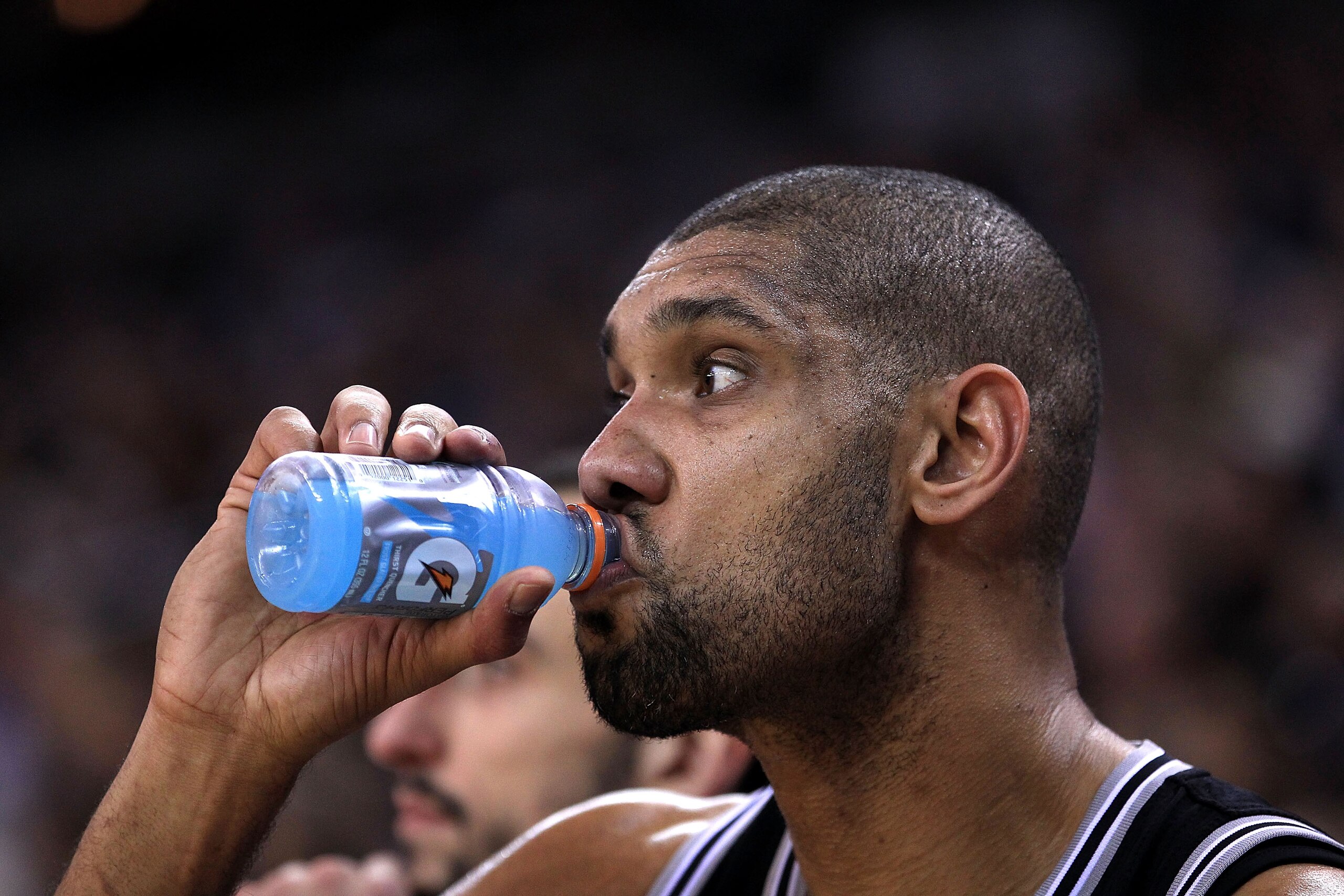 OAKLAND, CA - JANUARY 24: Tim Duncan #21 of the San Antonio Spurs drinks a Gatorade while sitting on the bench during their game against the Golden State Warriors at Oracle Arena on January 24, 2011 in Oakland, California. NOTE TO USER: User expressly a OAKLAND, CA - JANUARY 24: Tim Duncan #21 of the San Antonio Spurs drinks a Gatorade while sitting on the bench during their game against the Golden State Warriors at Oracle Arena on January 24, 2011 in Oakland, California. NOTE TO USER: User expressly a