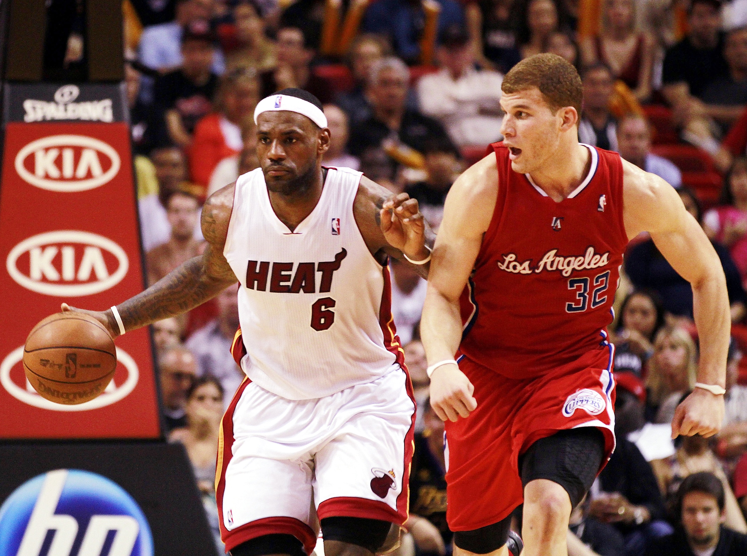 MIAMI - FEBRUARY 06: Forward LeBron James #6 of the Miami Heat drives against guard Forward Blake Griffin #32 of the L.A. Clippers at American Airlines Arena on February 6, 2011 in Miami, Florida. NOTE TO USER: User expressly acknowledges and agrees that MIAMI - FEBRUARY 06: Forward LeBron James #6 of the Miami Heat drives against guard Forward Blake Griffin #32 of the L.A. Clippers at American Airlines Arena on February 6, 2011 in Miami, Florida. NOTE TO USER: User expressly acknowledges and agrees that