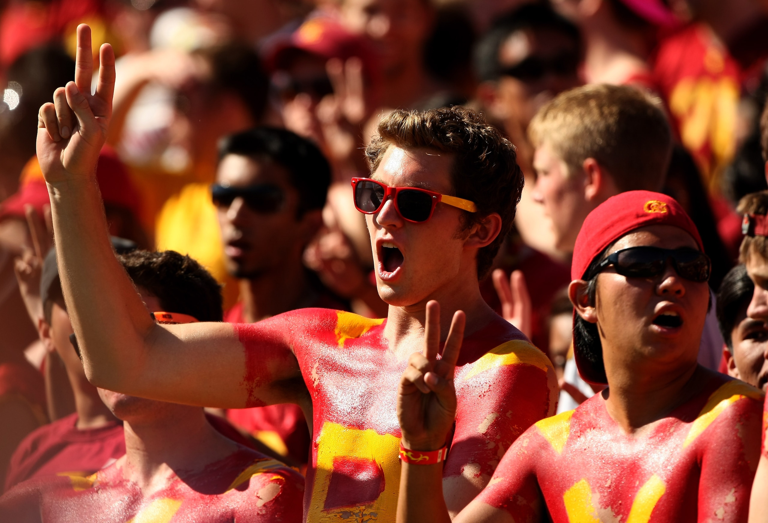 LOS ANGELES - SEPTEMBER 5:   USC Trojans fans cheer during the game with the San Jose State Spartans on September 5, 2009 at the Los Angeles Coliseum in Los Angeles, California.   (Photo by Stephen Dunn/Getty Images)