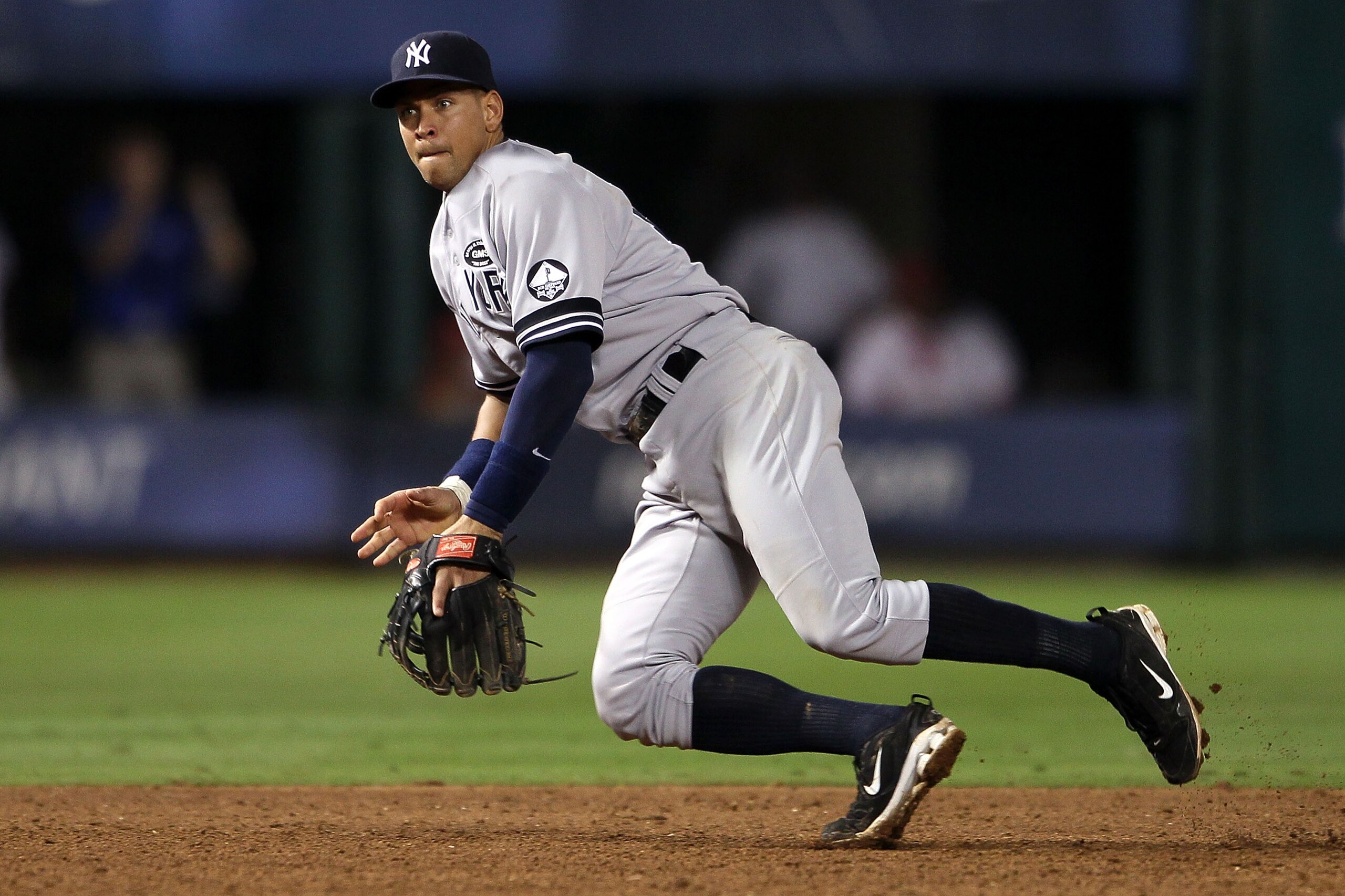 ARLINGTON, TX - OCTOBER 22: Alex Rodriguez #13 of the New York Yankees makes a play for a ball on defense against the Texas Ranger in Game Six of the ALCS during the 2010 MLB Playoffs at Rangers Ballpark in Arlington on October 22, 2010 in Arlington, Tex ARLINGTON, TX - OCTOBER 22: Alex Rodriguez #13 of the New York Yankees makes a play for a ball on defense against the Texas Ranger in Game Six of the ALCS during the 2010 MLB Playoffs at Rangers Ballpark in Arlington on October 22, 2010 in Arlington, Tex