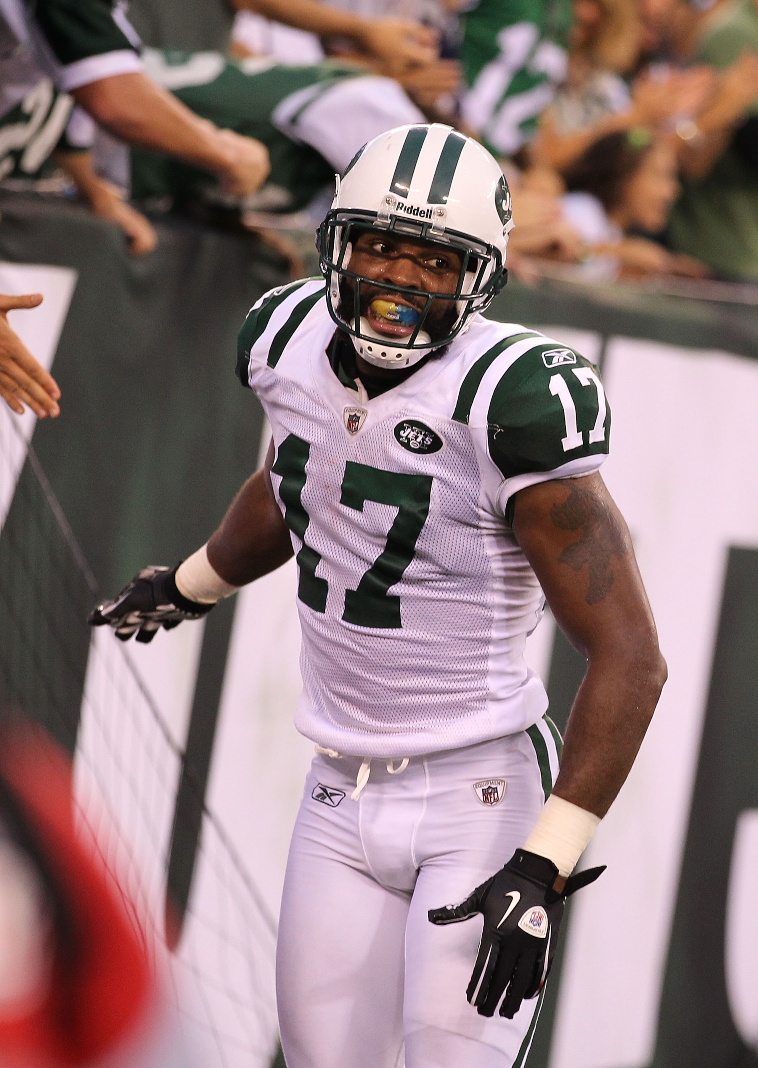 EAST RUTHERFORD, NJ - SEPTEMBER 19:  Braylon Edwards #17 of the New York Jets scores a two point conversion against Terrence Wheatley #22 of the New England Patriots during their  game on September 19, 2010 at the New Meadowlands Stadium  in East Rutherfo