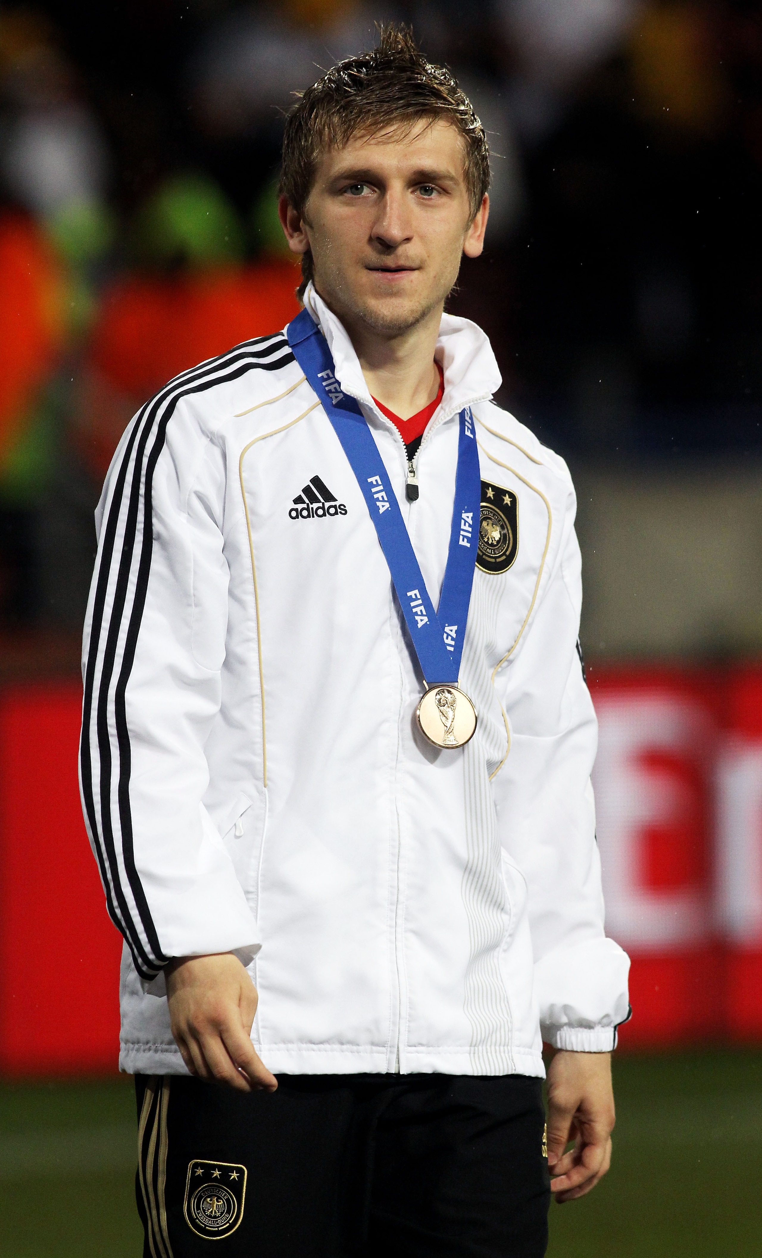 PORT ELIZABETH, SOUTH AFRICA - JULY 10: Marko Marin of Germany celebrates victory and third place following the 2010 FIFA World Cup South Africa Third Place Play-off match between Uruguay and Germany at The Nelson Mandela Bay Stadium on July 10, 2010 in PORT ELIZABETH, SOUTH AFRICA - JULY 10: Marko Marin of Germany celebrates victory and third place following the 2010 FIFA World Cup South Africa Third Place Play-off match between Uruguay and Germany at The Nelson Mandela Bay Stadium on July 10, 2010 in