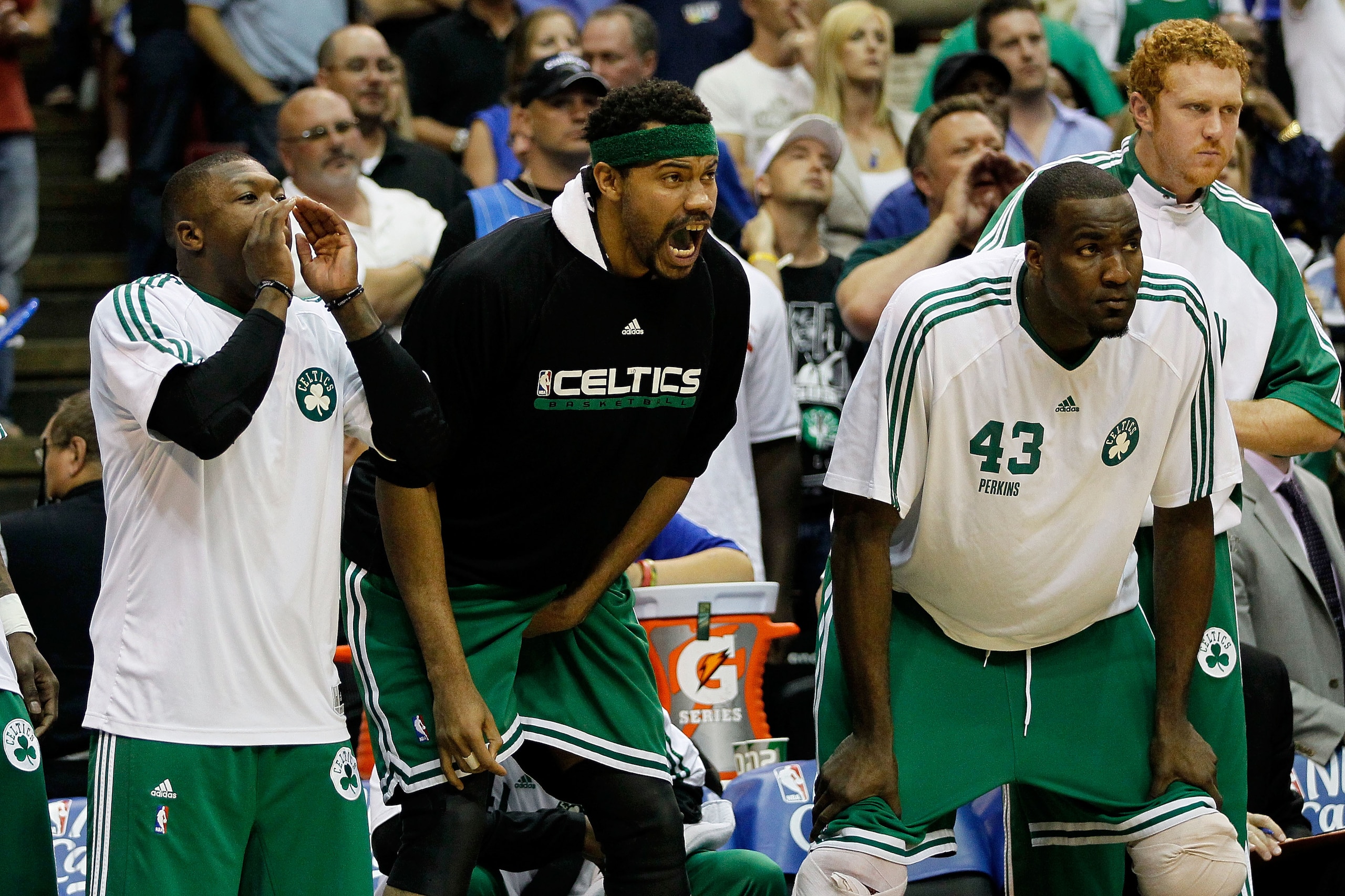 ORLANDO, FL - MAY 18:  (L-R) Nate Robinson #4, Rasheed Wallace #30 and Kendrick Perkins #43 of the Boston Celtics cheer on their teammates from the bench against the Orlando Magic in Game Two of the Eastern Conference Finals during the 2010 NBA Playoffs a
