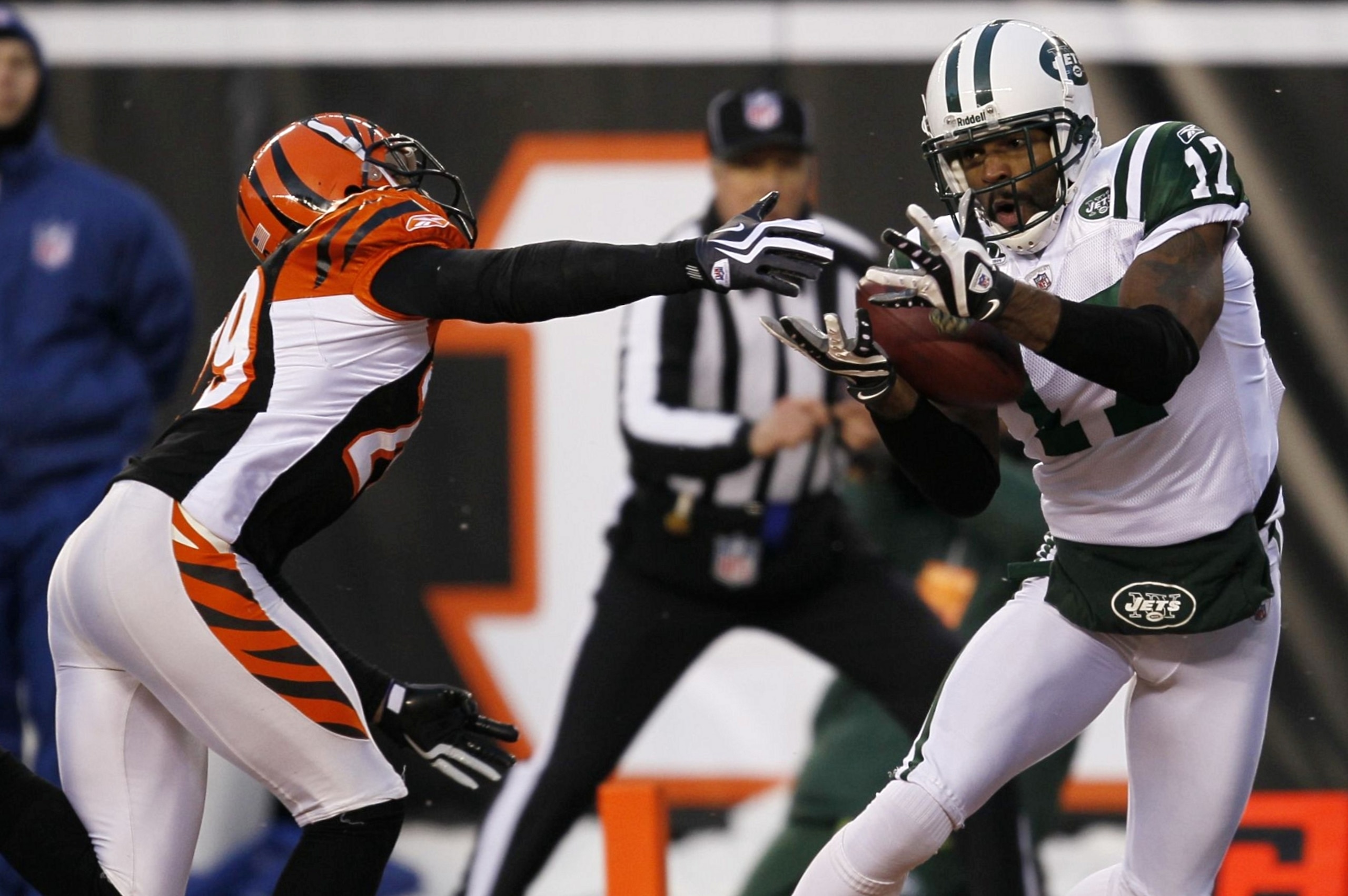 CINCINNATI - JANUARY 9:  Braylon Edwards #17 of the New York Jets drops a pass in the endzone against Leon Hall #29 of the Cincinnati Bengals in the first half during the 2010 AFC wild-card playoff game at Paul Brown Stadium on January 9, 2010 in Cincinna