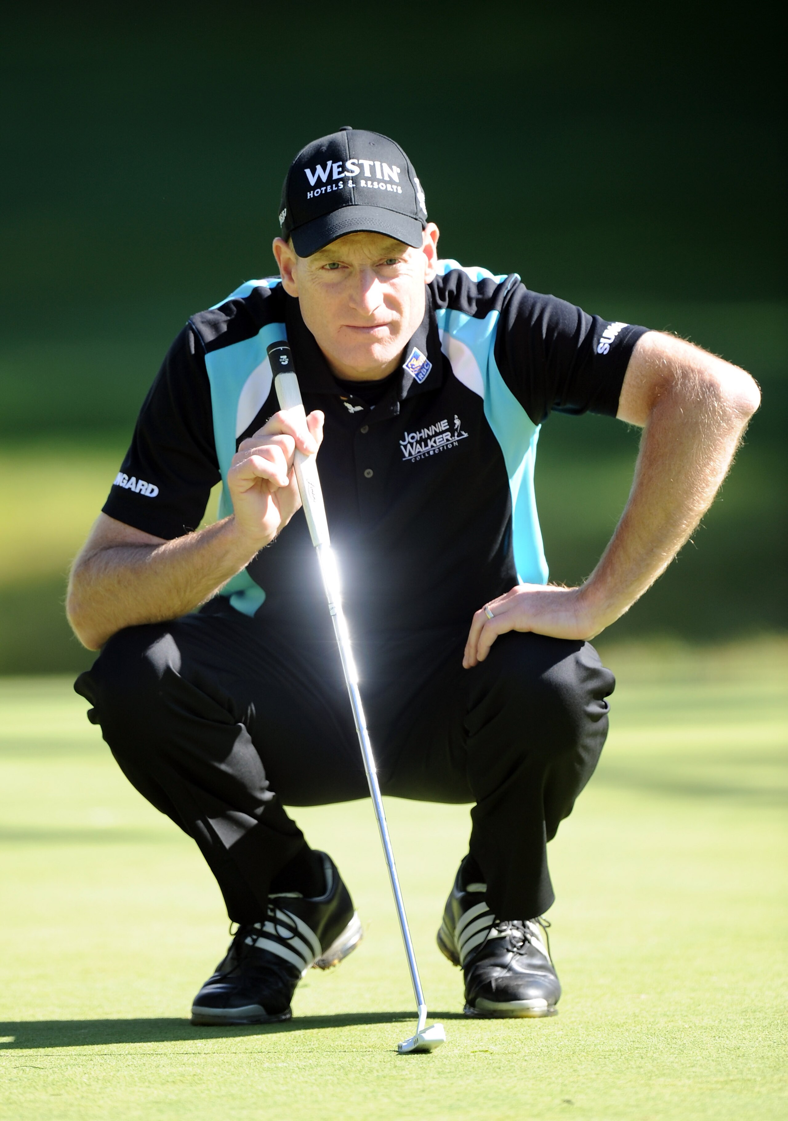 PACIFIC PALISADES, CA - FEBRUARY 17:  Jim Furyk lines up a putt on the 12th hole during the first round of the Northern Trust Open at the Riviera Country Club on February 17, 2011 in Pacific Palisades, California.  (Photo by Harry How/Getty Images)