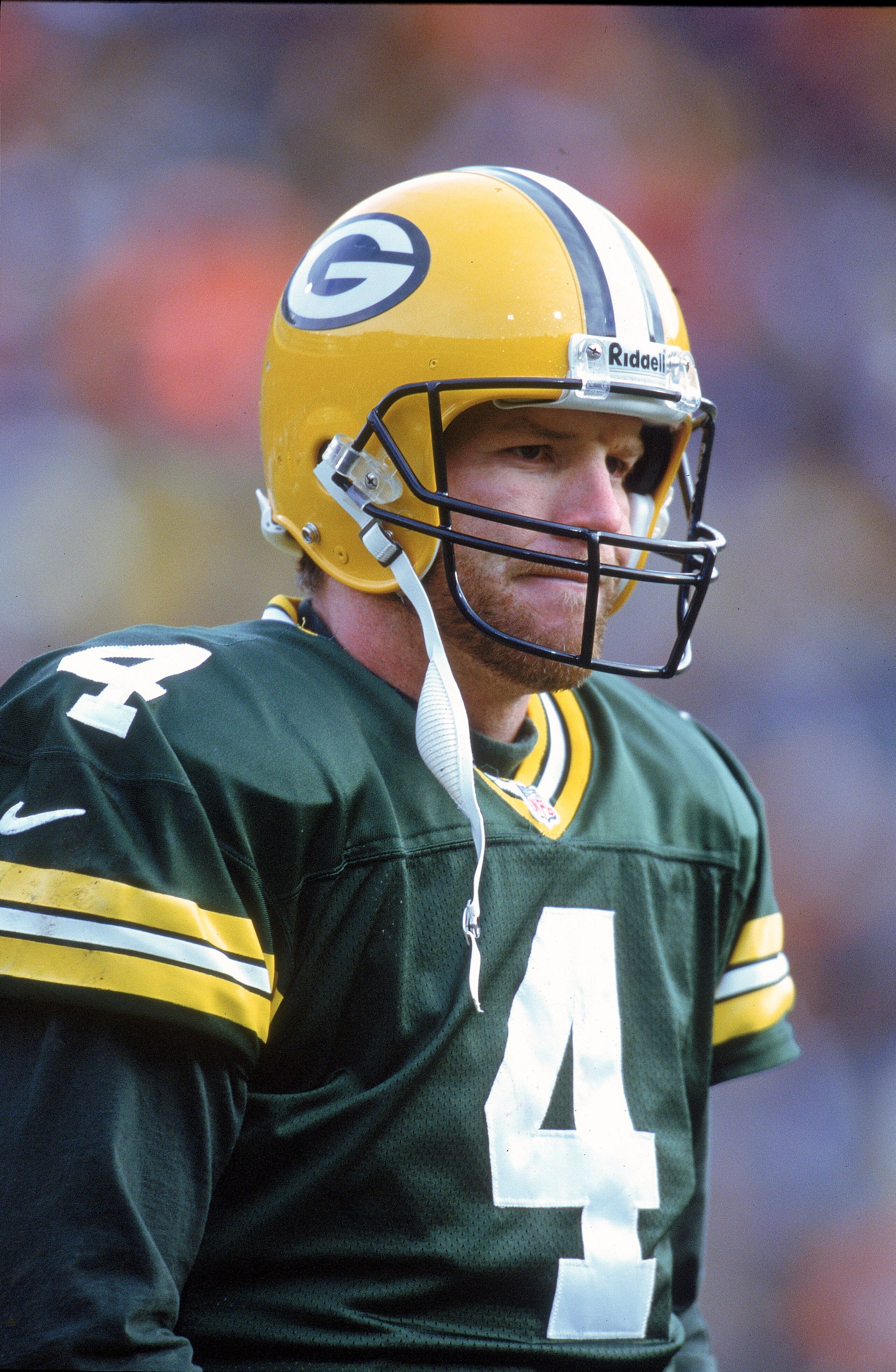 10 Dec 2000:  Quarterback Brett Favre #4 of the Green Bay Packers walks on the field during the game against the Detroit Lions at Lambeau Field in Green Bay, Wisconsin. The Packers defeated the Lions 26-13.Mandatory Credit: Matthew Stockman  /Allsport