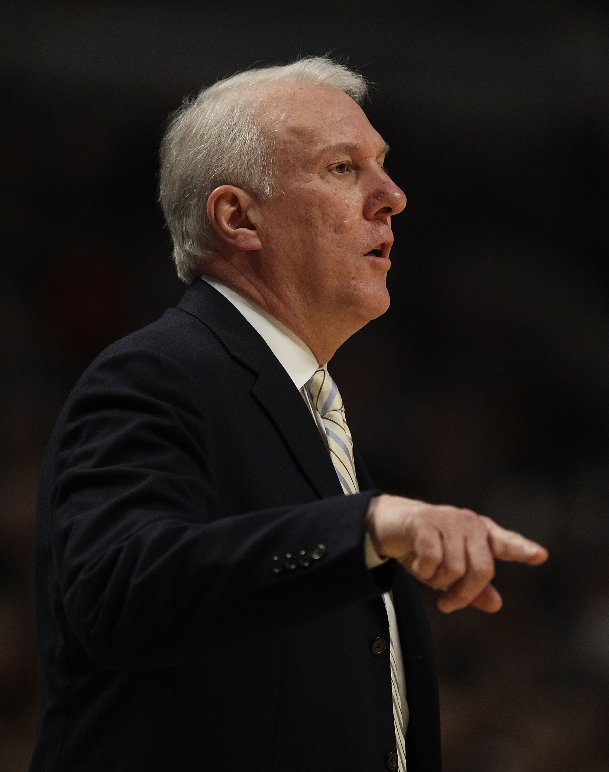 CHICAGO, IL - FEBRUARY 17: Head coach Gregg Popovich of the San Antonio Spurs gives instructions to his team during a game against the Chicago Bulls at the United Center on February 17, 2011 in Chicago, Illinois. The Bulls defeated the Spurs 109-99. NOTE 