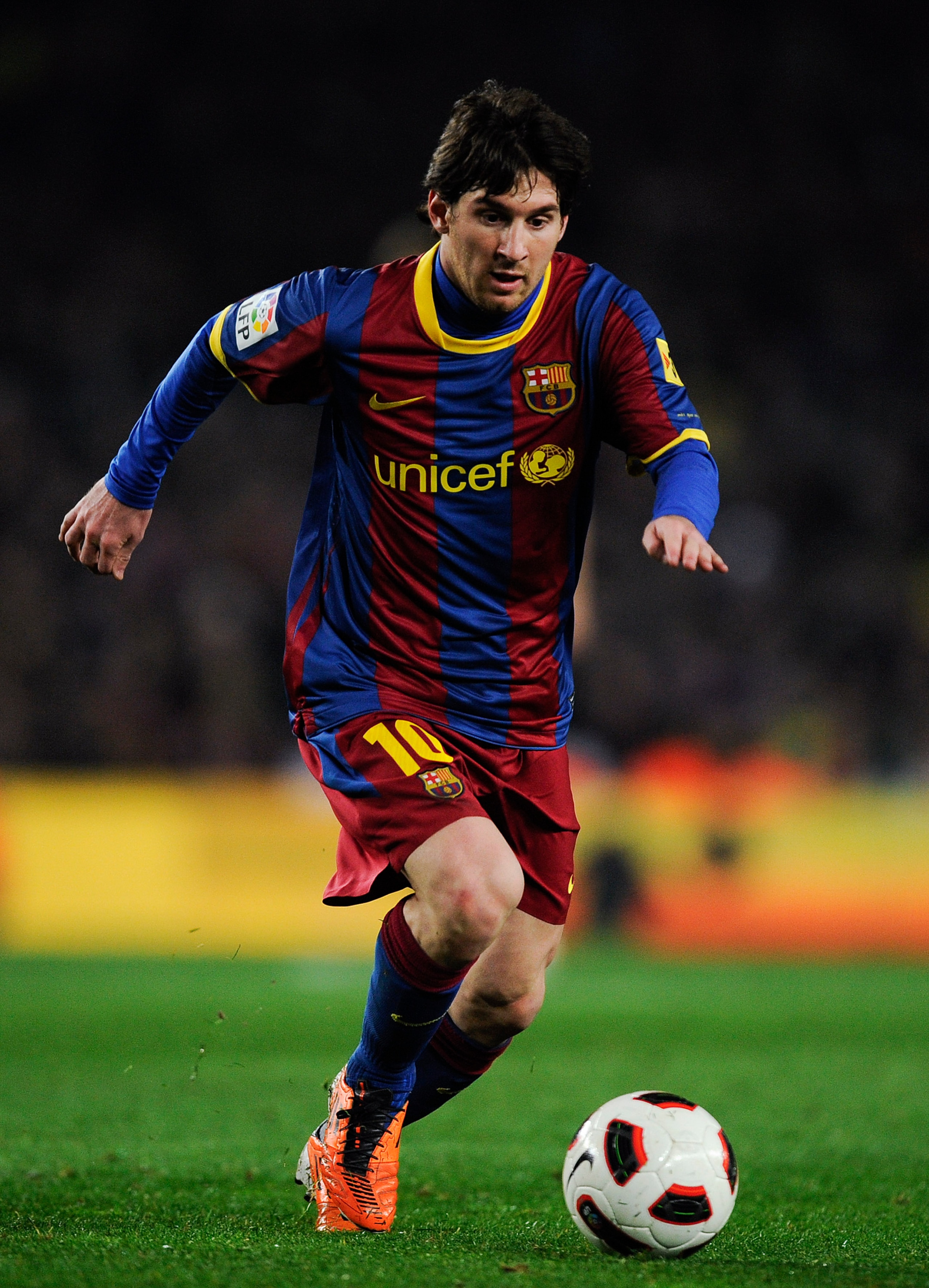 BARCELONA, SPAIN - FEBRUARY 20: Lionel Messi of FC Barcelona runs with the ball during the La Liga match between FC Barcelona and Athletic Bilbao at Camp Nou on February 20, 2011 in Barcelona, Spain. Barcelona won 2-1. (Photo by David Ramos/Getty Images BARCELONA, SPAIN - FEBRUARY 20: Lionel Messi of FC Barcelona runs with the ball during the La Liga match between FC Barcelona and Athletic Bilbao at Camp Nou on February 20, 2011 in Barcelona, Spain. Barcelona won 2-1. (Photo by David Ramos/Getty Images