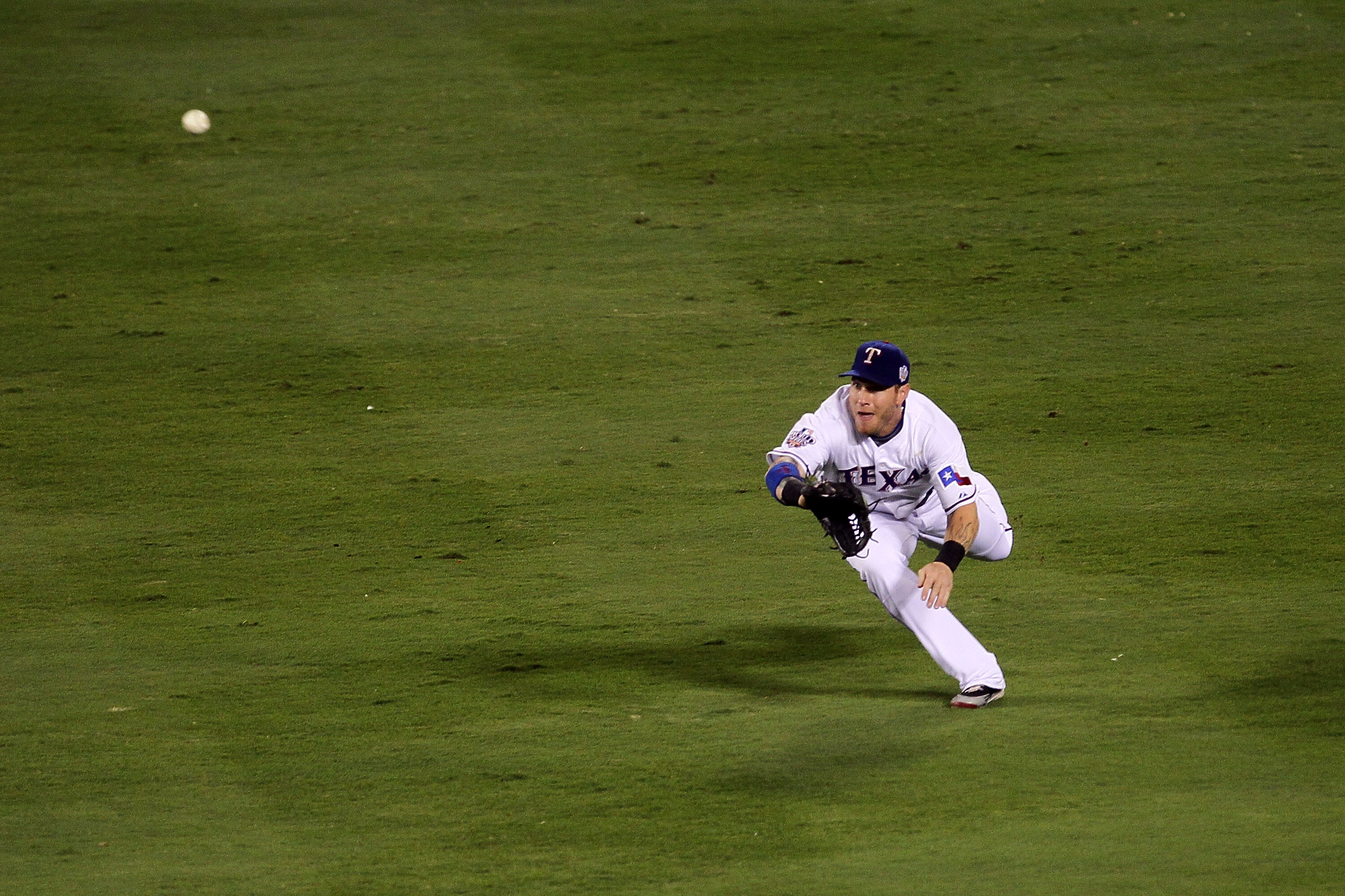 ARLINGTON, TX - OCTOBER 31:  Josh Hamilton #32 of the Texas Rangers makes a diving catch in the second inning against the San Francisco Giants in Game Four of the 2010 MLB World Series at Rangers Ballpark in Arlington on October 31, 2010 in Arlington, Tex