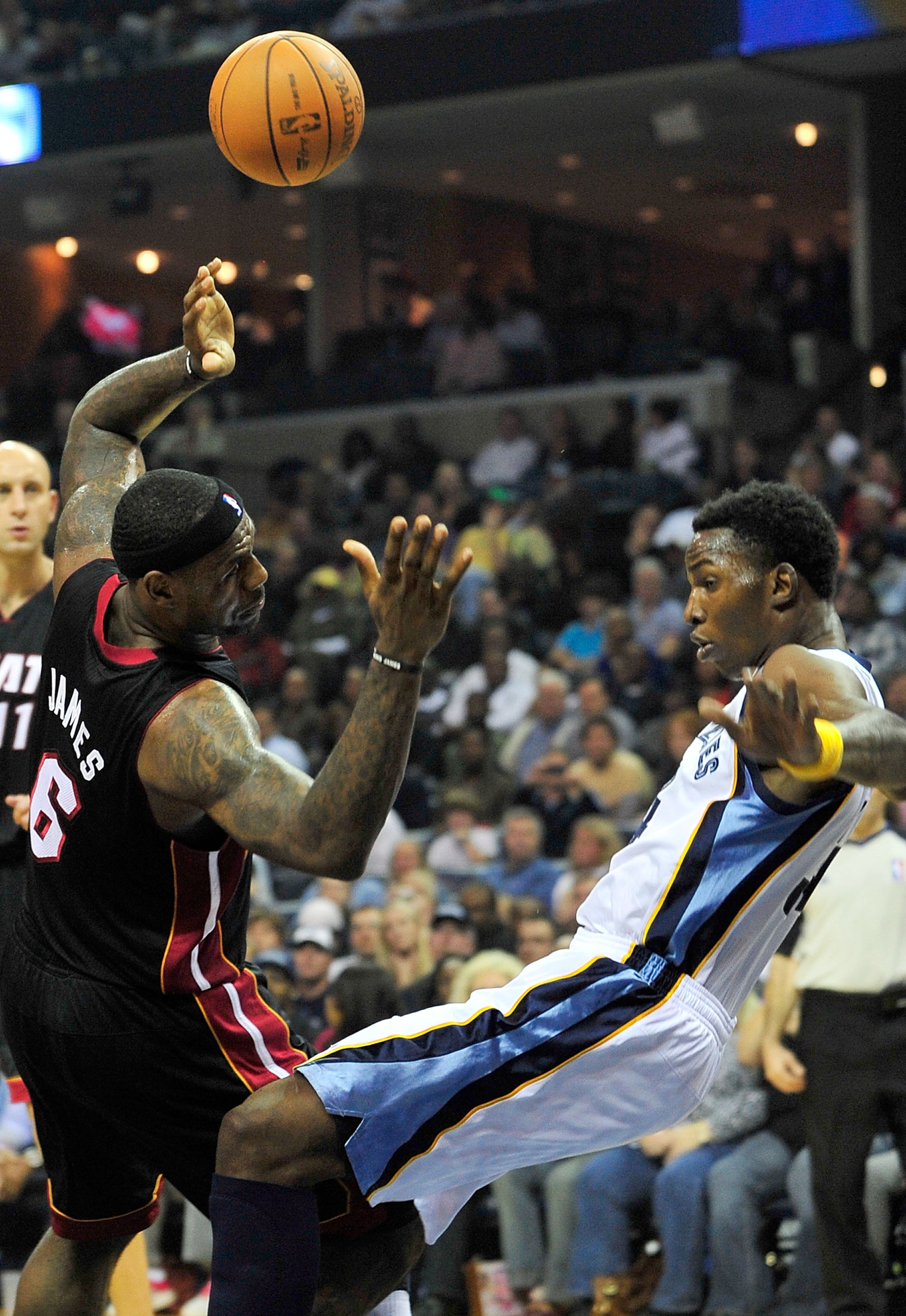 MEMPHIS, TN - NOVEMBER 20:  LeBron James #6 of the Miami Heat draws a blocking foul on Hasheem Thabeet #34 of the Memphis Grizzlies at FedExForum on November 20, 2010 in Memphis, Tennessee.  NOTE TO USER: User expressly acknowledges and agrees that, by do