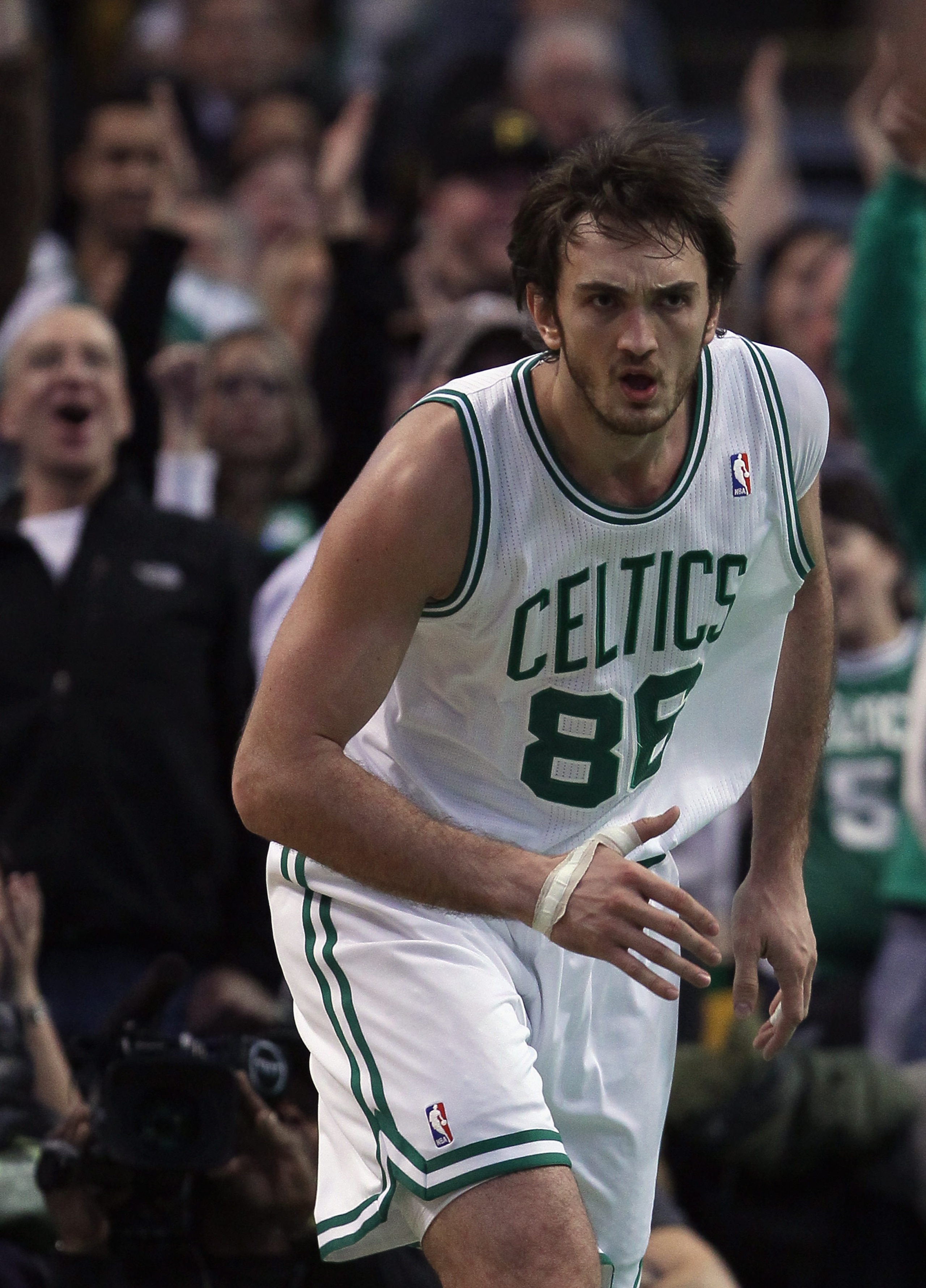 BOSTON, MA - DECEMBER 16:  Semih Erden #86 of the Boston Celtics celebrates his basket against the Atlanta Hawks on December 16, 2010 at the TD Garden in Boston, Massachusetts. The Celtics defeated the Hawks 102-90. NOTE TO USER: User expressly acknowledg