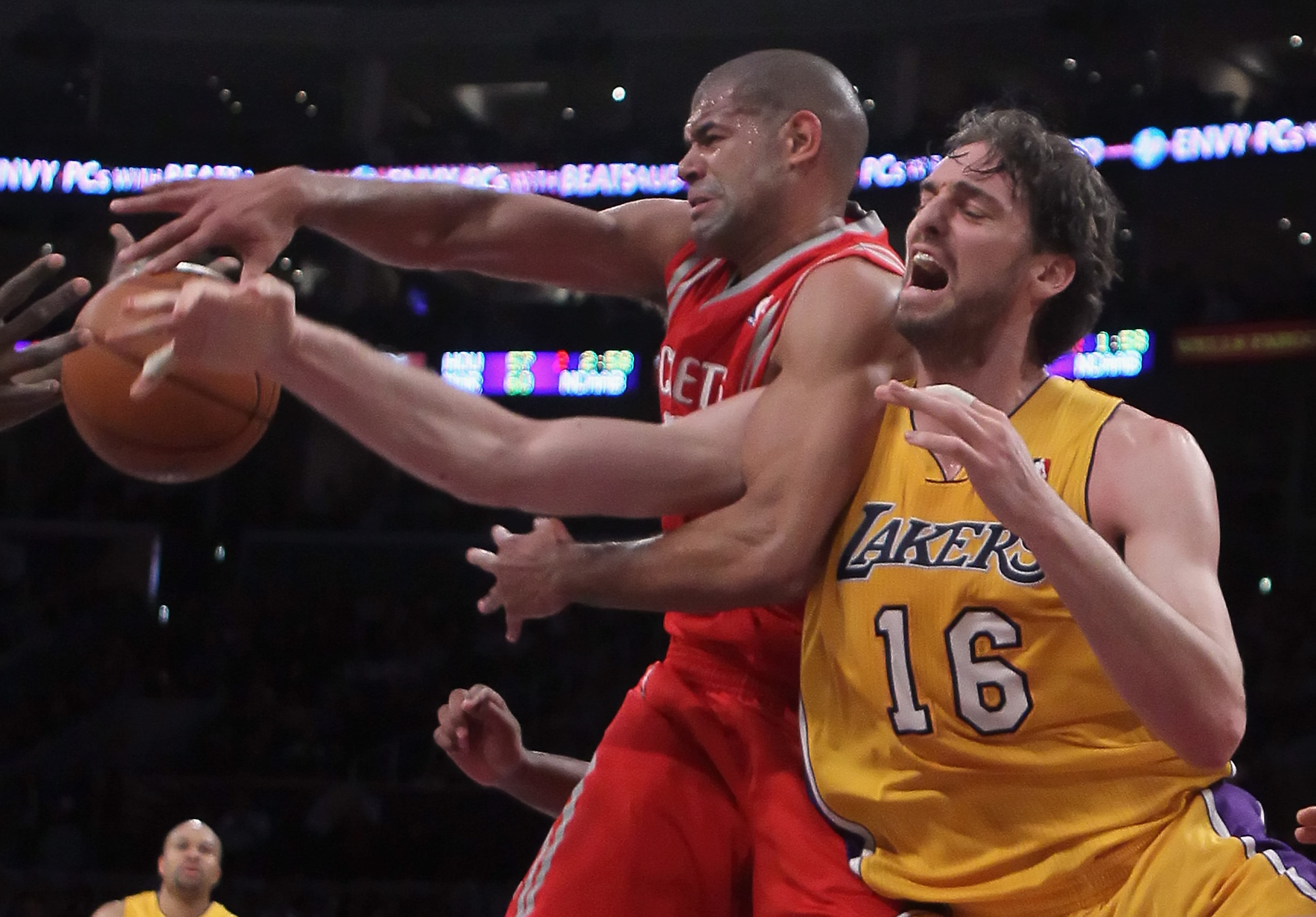 LOS ANGELES, CA - FEBRUARY 01:  Pau Gasol #16 of the Los Angeles Lakers and Shane Battier #31 of the Houston Rockets battle for a rebound in the first half at Staples Center on February 1, 2011 in Los Angeles, California. The Lakers defeated the Rockets 1