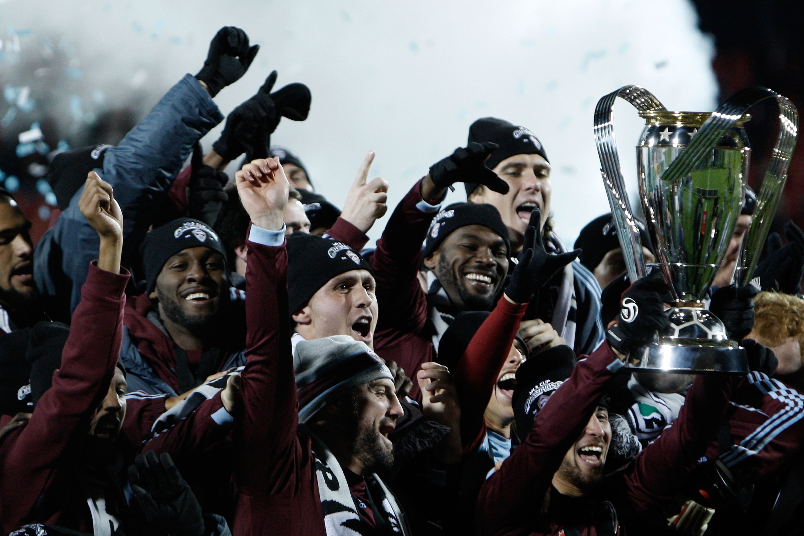TORONTO, ON - NOVEMBER 21:  Kosuke Kimura #27 of the Colorado Rapids holds the Philip F. Anschutz Trophy and celebrates with teammates after their 2-1 overtime victory against FC Dallas during the 2010 MLS Cup match at BMO Field on November 21, 2010 in To