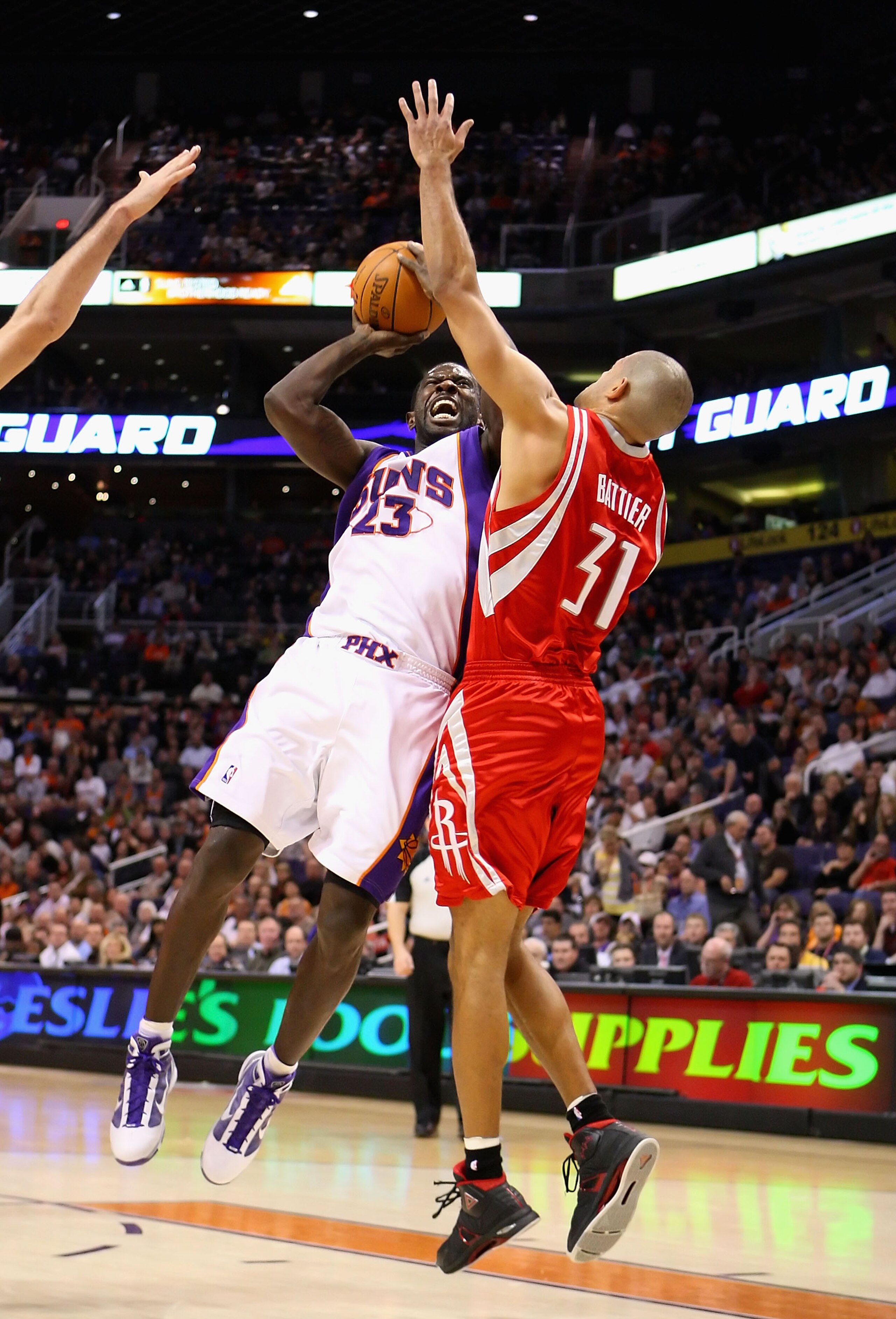 PHOENIX - JANUARY 06: Jason Richardson #23 of the Phoenix Suns puts up a shot against Shane Battier #31 of the Houston Rockets during the NBA game at US Airways Center on January 6, 2010 in Phoenix, Arizona. The Suns defeated the Rockets 118-110. NOTE T PHOENIX - JANUARY 06: Jason Richardson #23 of the Phoenix Suns puts up a shot against Shane Battier #31 of the Houston Rockets during the NBA game at US Airways Center on January 6, 2010 in Phoenix, Arizona. The Suns defeated the Rockets 118-110. NOTE T