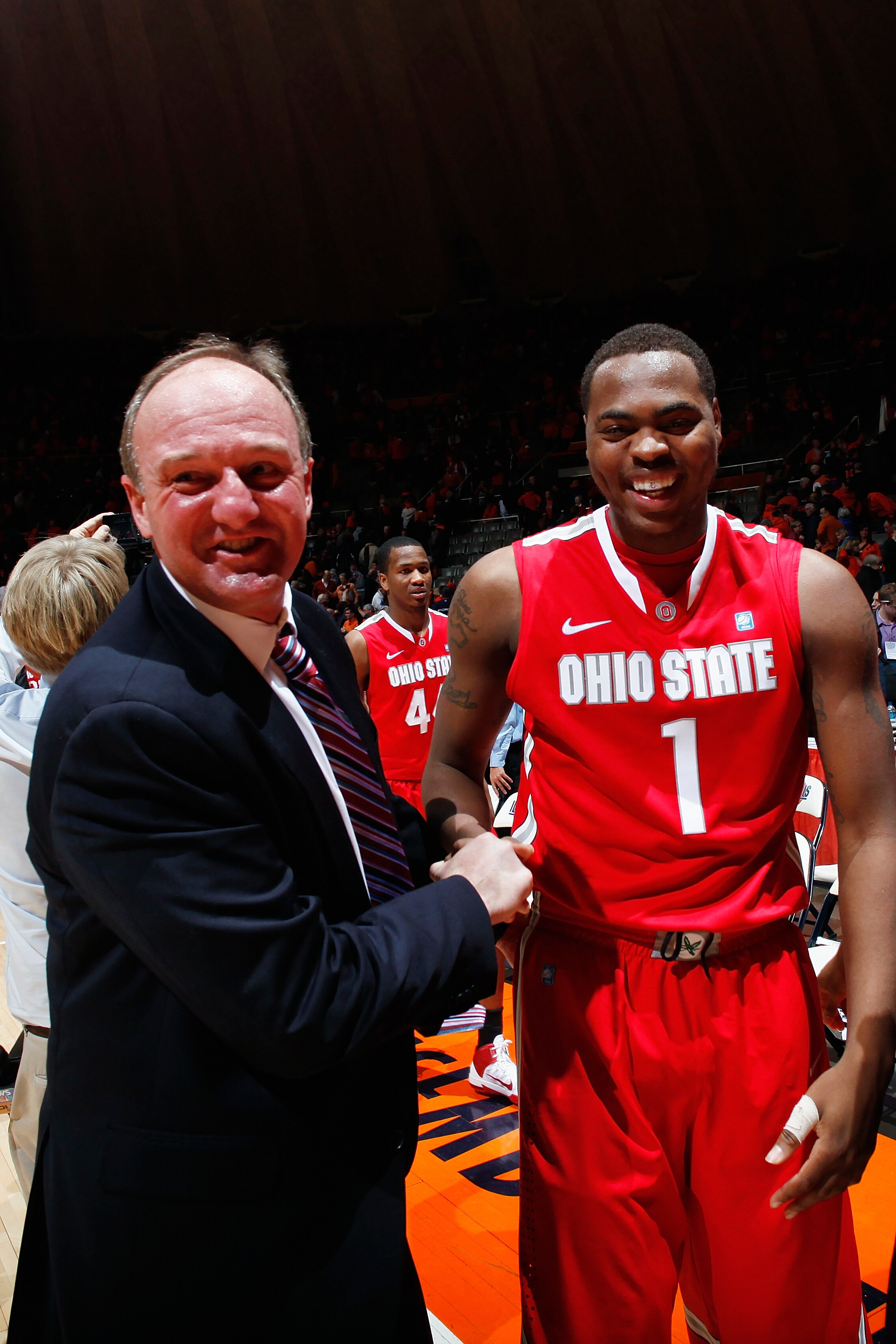 CHAMPAIGN, IL - JANUARY 22: Ohio State Buckeyes head coach Thad Matta celebrates with Deshaun Thomas #1 following the game against the Illinois Fighting Illini at Assembly Hall on January 22, 2011 in Champaign, Illinois. Ohio State won 73-68. (Photo by Jo