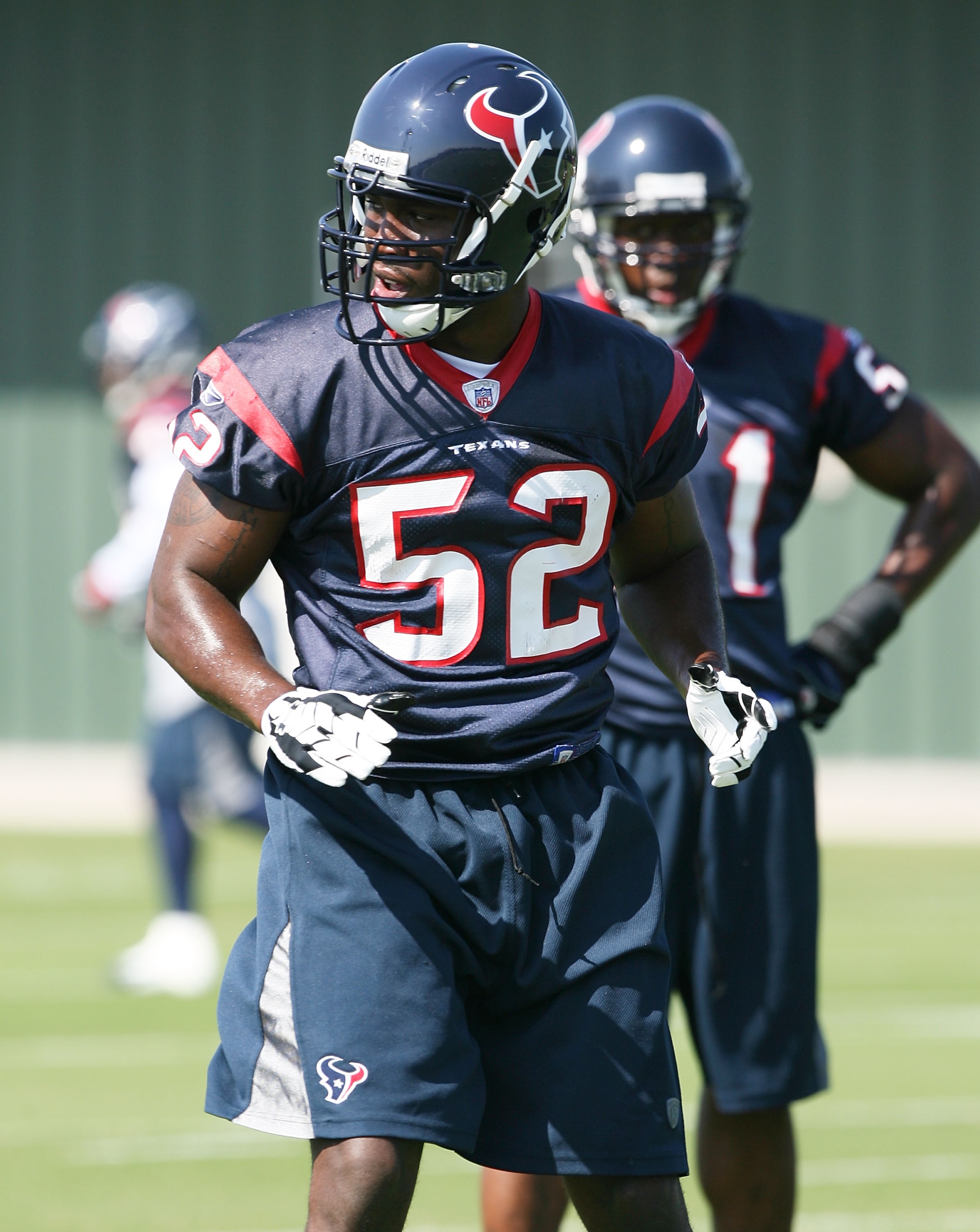 HOUSTON - MAY 09:  Rookie linebacker from Virginia Tech  Xavier Adibi #52 of the Houston Texans participates in morning drills May 9, 2008 in Houston,Texas.  (Photo by Bob Levey/Getty Images)