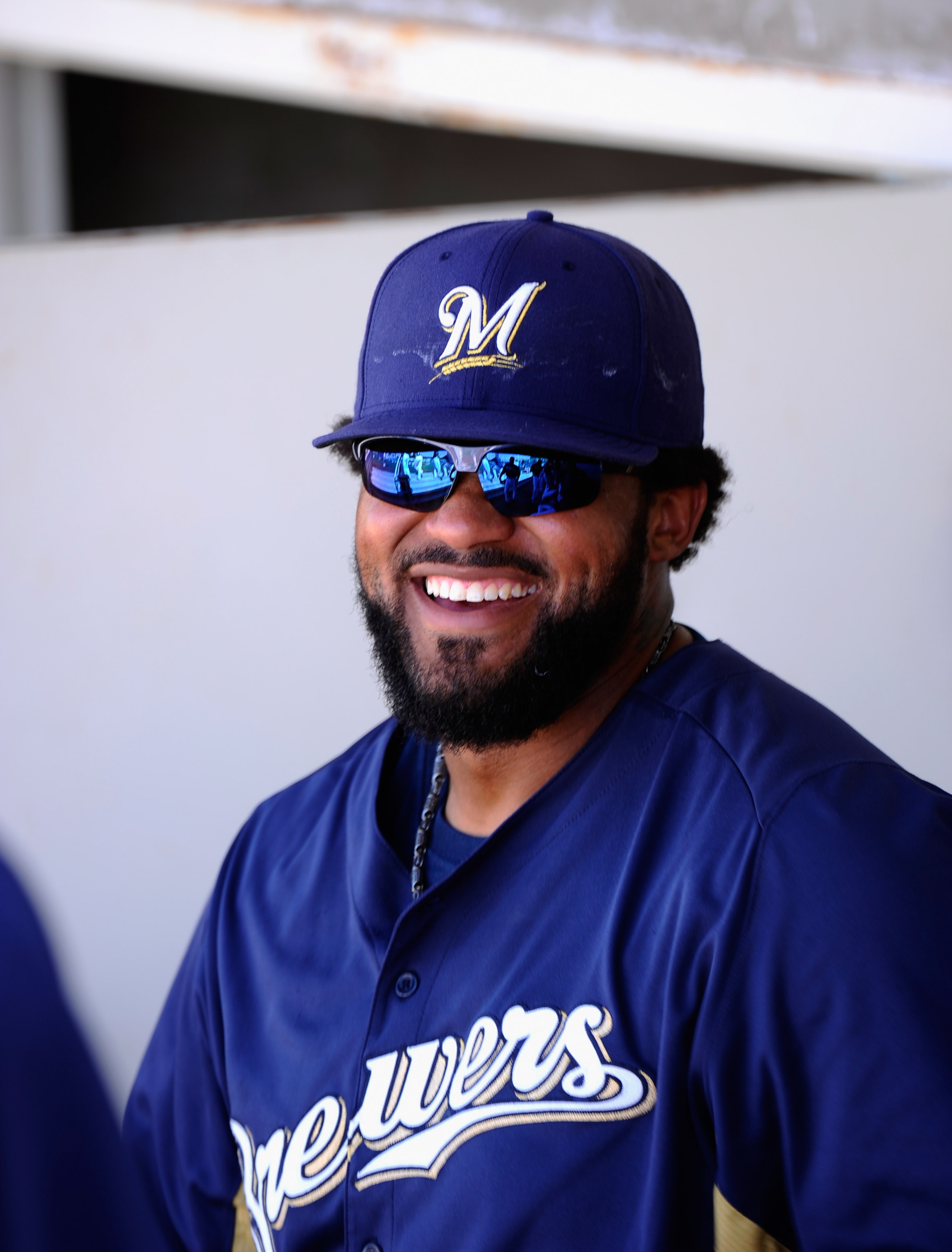 PHOENIX, AZ - MARCH 10:  Prince Fielder#28 of the Milwaukee Brewers in the dugout against the Colorado Rockies during spring training baseball game at Maryvale Baseball Park on March 10, 2011 in Phoenix, Arizona.  (Photo by Kevork Djansezian/Getty Images)