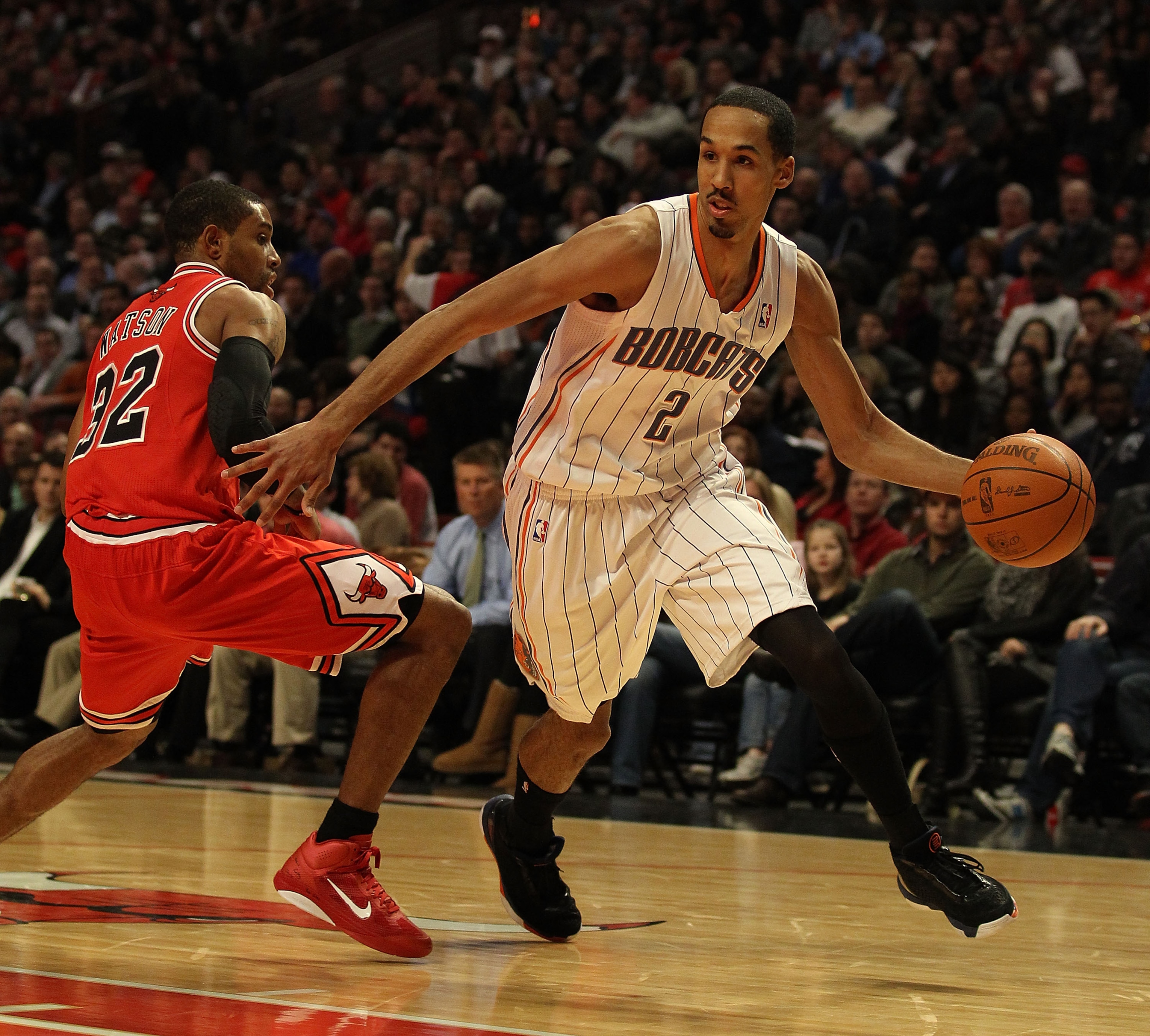 CHICAGO, IL - FEBRUARY 15: Shaun Livingston #2 of the Charlotte Bobcats moves around C.J. Watson #32 of the Chicago Bulls at the United Center on February 15, 2011 in Chicago, Illinois. The Bulls defeated the Bobcats 106-94. NOTE TO USER: User expressly a