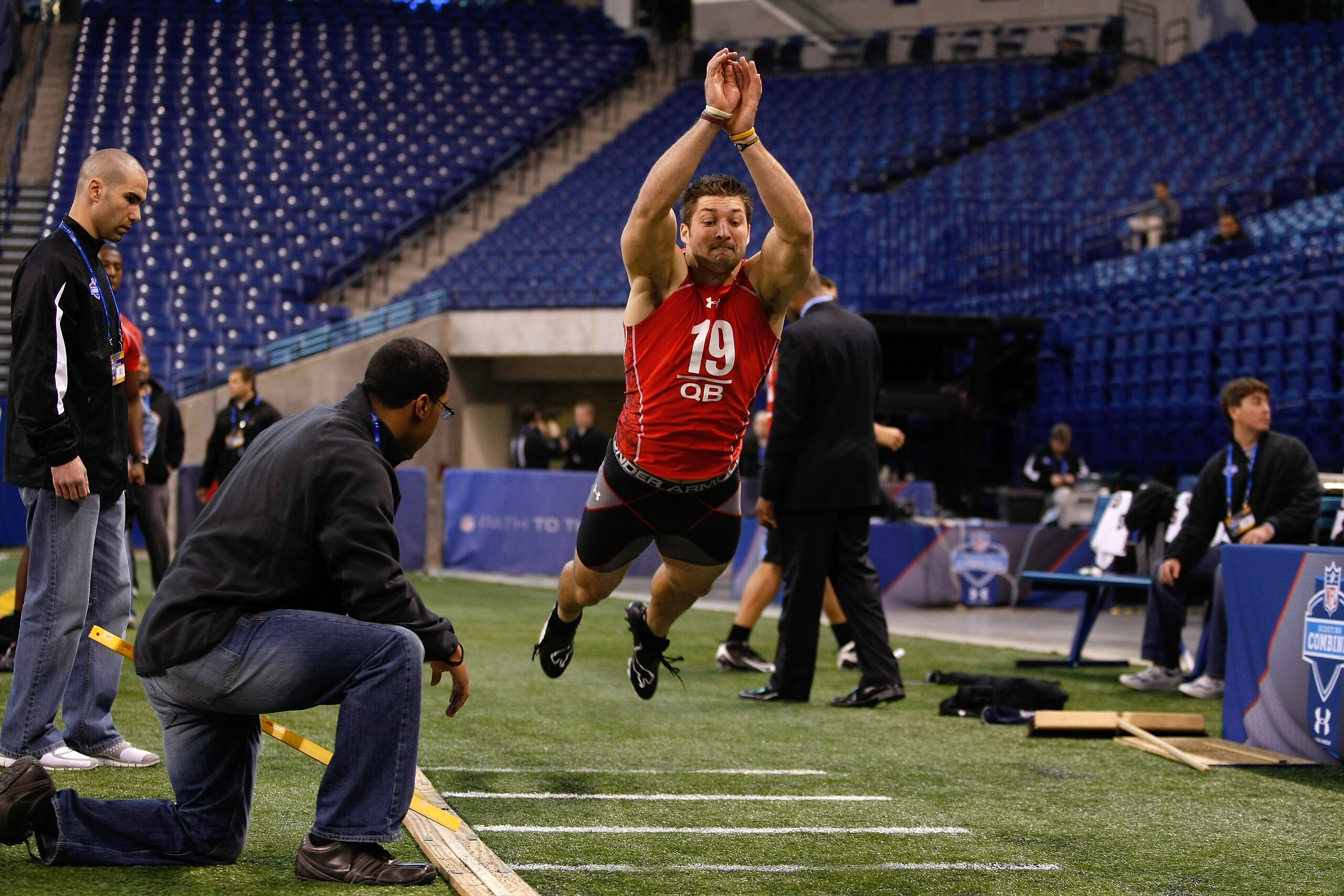 INDIANAPOLIS, IN - FEBRUARY 28: Quarterback Tim Tebow of Florida performs the long jump during the NFL Scouting Combine presented by Under Armour at Lucas Oil Stadium on February 28, 2010 in Indianapolis, Indiana. (Photo by Scott Boehm/Getty Images)