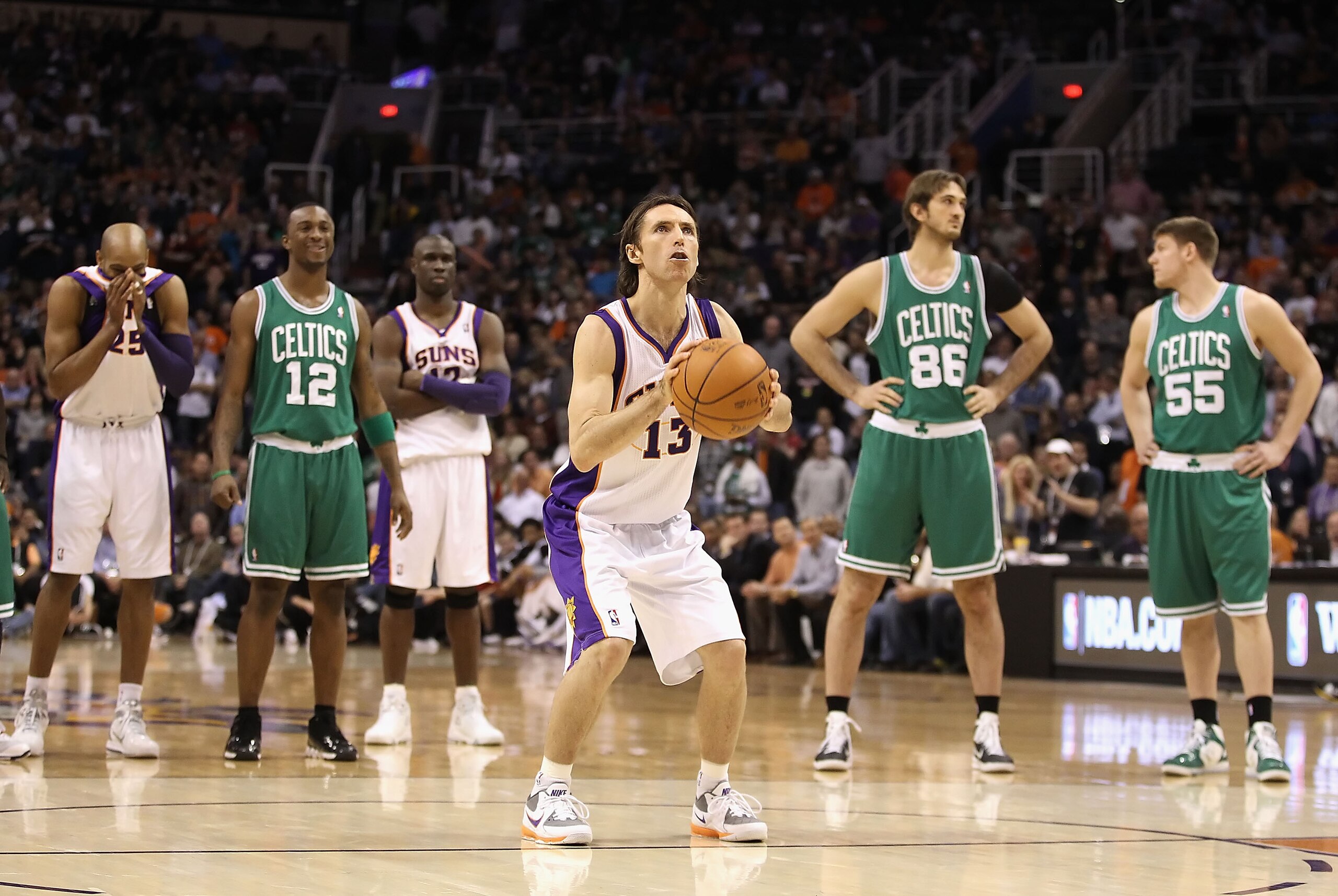 PHOENIX, AZ - JANUARY 28:  Steve Nash #13 of the Phoenix Suns shoots free throw shots after the Boston Celtics were charged with double technical fouls during the NBA game at US Airways Center on January 28, 2011 in Phoenix, Arizona.   The Suns defeated t