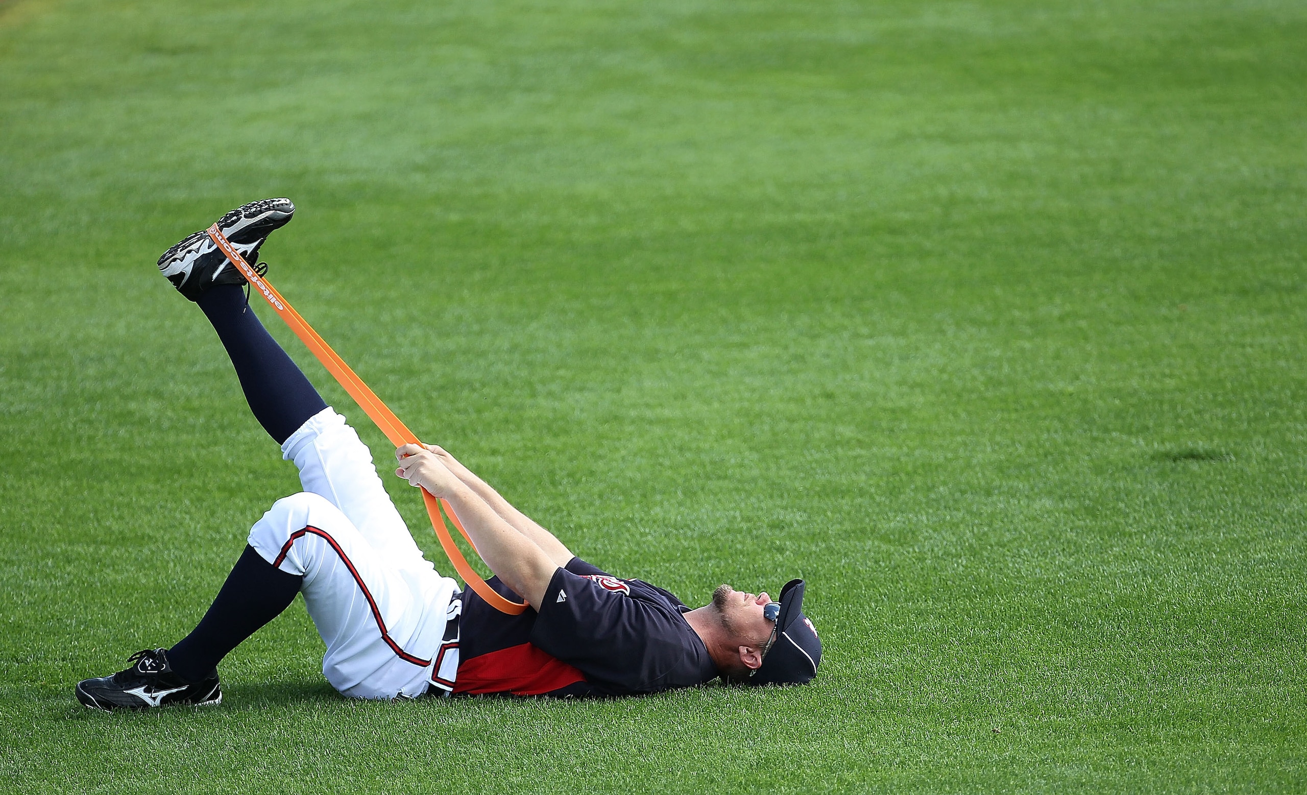 LAKE BUENA VISTA, FL - FEBRUARY 21:  Chipper Jones #10 of the Atlanta Braves stretches during a spring training workout at Champion Stadium on February 21, 2011 in Lake Buena Vista, Florida.  (Photo by Mike Ehrmann/Getty Images)