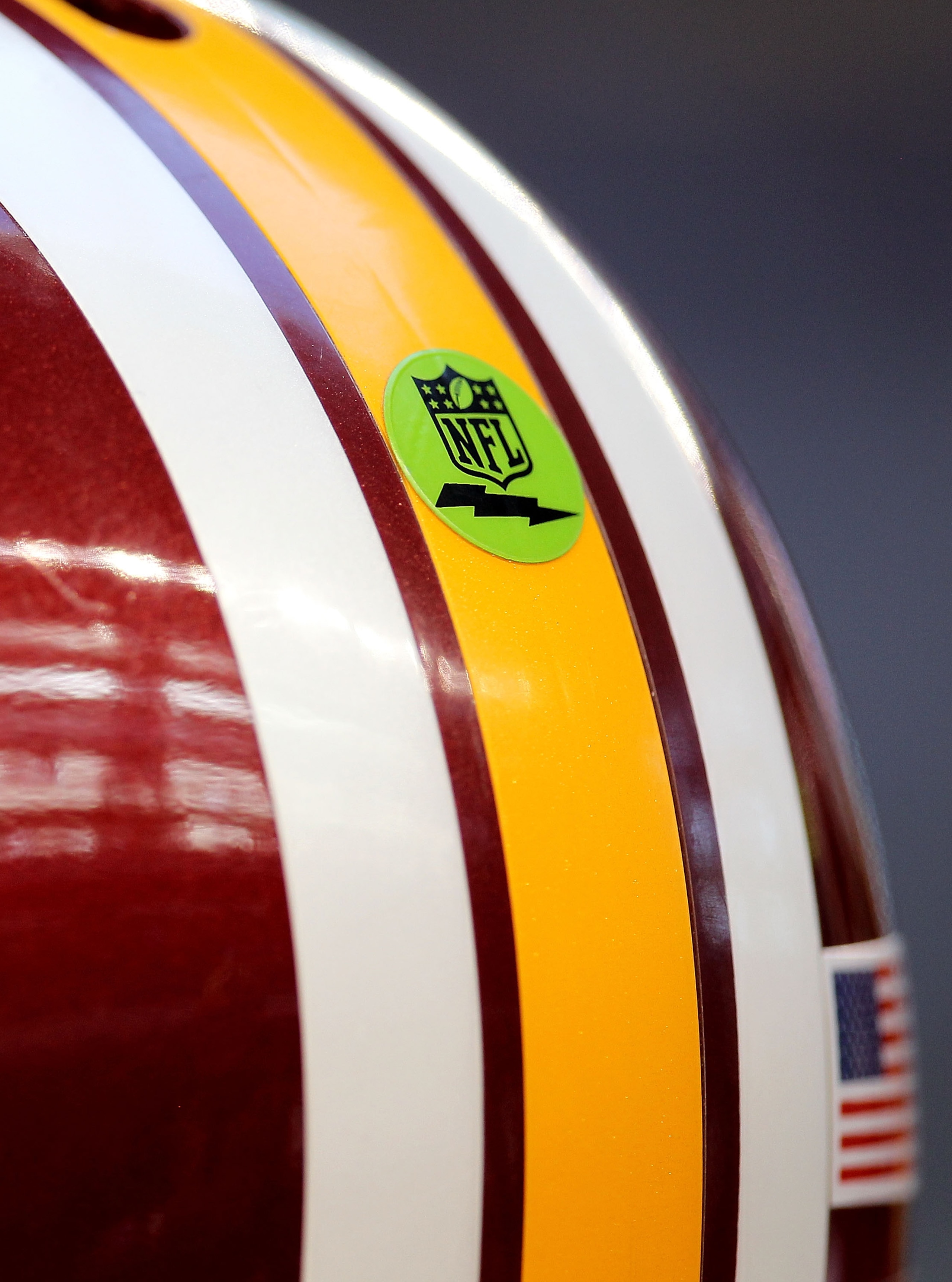 ARLINGTON, TX - DECEMBER 19:  Quarterback Rex Grossman #8 of the Washington Redskins with the green NFL sticker on his helmet during play against the Dallas Cowboys at Cowboys Stadium on December 19, 2010 in Arlington, Texas.  (Photo by Ronald Martinez/Ge