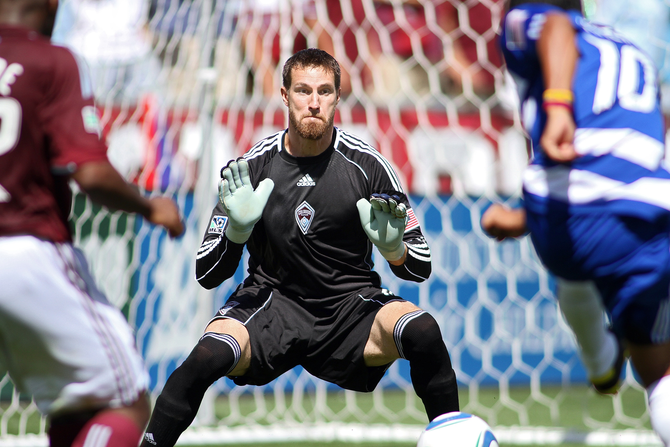 COMMERCE CITY, CO - JULY 31 : Goalkeeper Matt Pickens #18 of the Colorado Rapids faces a shot by David Ferreira #10 of FC Dallas during the second half at Dick's Sporting Goods Park on July 31, 2010 in Commerce City, Colorado. The game ended in a 1-1 draw